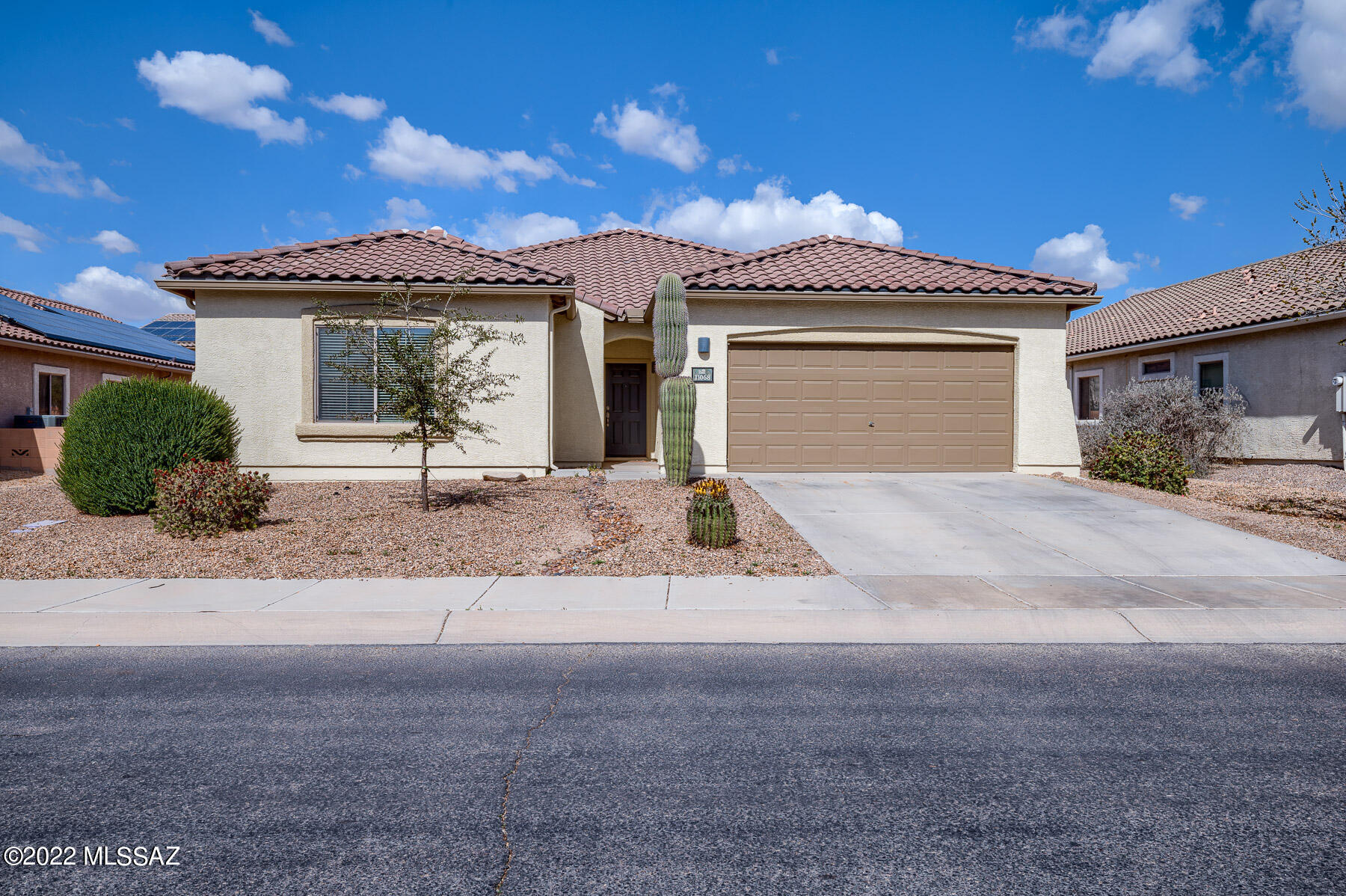 Seller will accept or counter offers between $375,000 and $390,000. Beautiful Home - 4 bedroom 2 bath home split bedroom plan for an extra bit of privacy. Newly painted, new carpeting installed, 9 foot ceilings throughout and an open floor plan. The kitchen features oak cabinets with an island, energy star appliances, and the wash and dryer will convey. The Interior has been professionally painted with laminate floors in common areas and carpet in the bedroom. The back yard is large and spacious with a full covered patio to rest and relax on. Will go quickly, hurry and see it today!