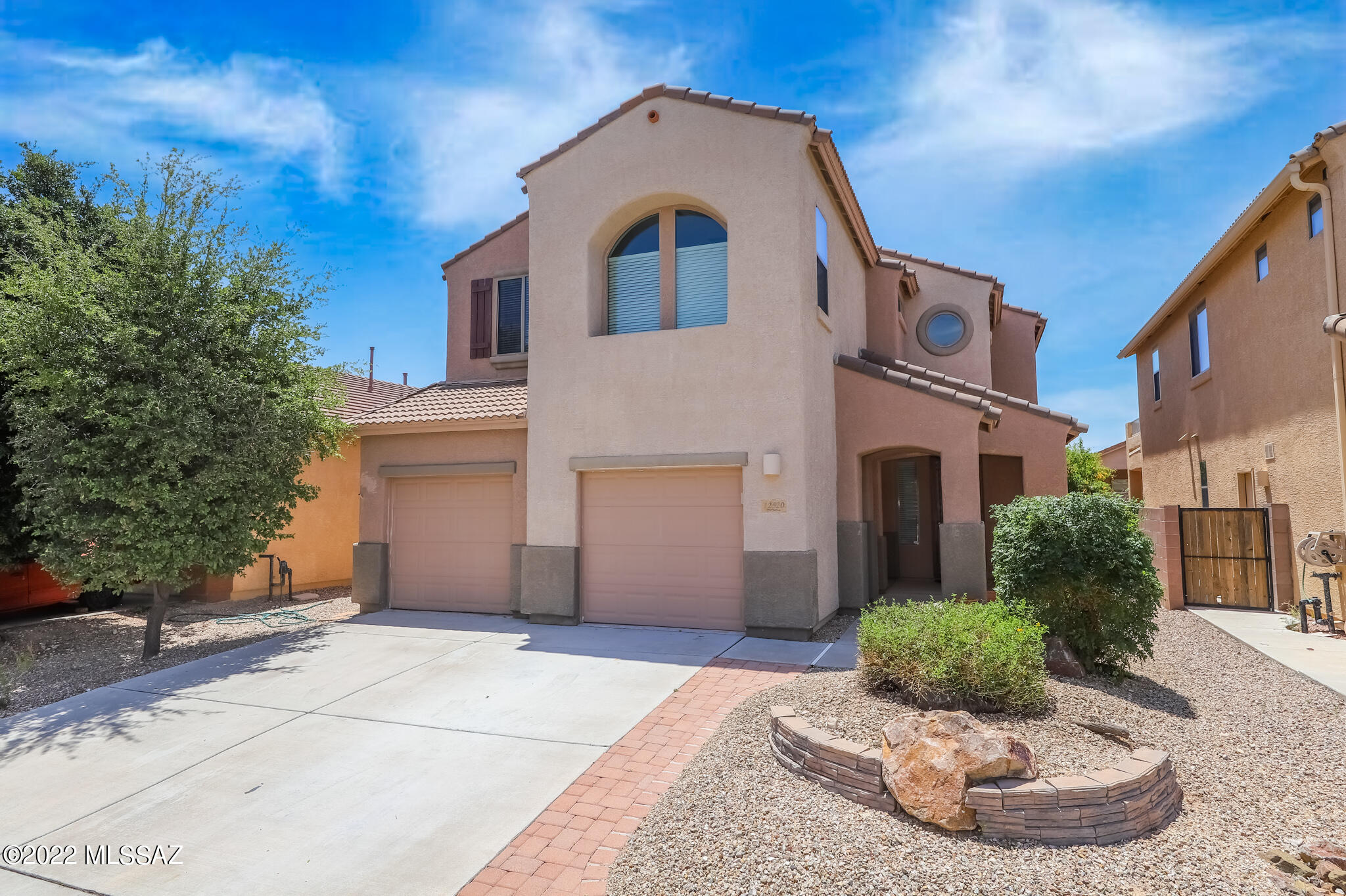Experience the feeling of out-of-town living, yet located just minutes from I-10 for easy commuting.  Situated at the end of a cul-de-sac, this 3br/3ba home in Vail has all the space you can ask for.  Inside enjoy fresh paint to get you started, large bedrooms and built in office/tech center to make working from home more convenient.  Primary bedroom has an oversized bathroom with dual sinks, walk in closet, and both shower and separate garden tub.  With plenty of room under your covered patio and lush grass area, your backyard is perfect for entertaining. Come see to truly appreciate.