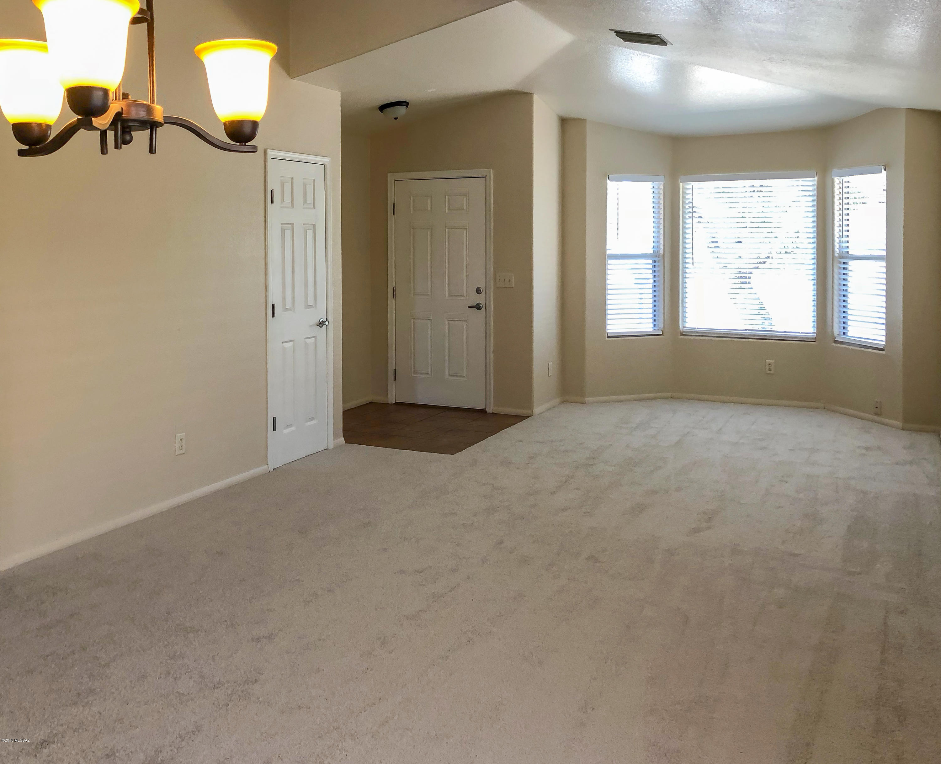 ange Pricing: Seller will accept/counter offers between $225,000-$245,000. Beautiful remodel!  Great open floorplan with 3 bedrooms and a den.  It has a formal living and dining with open kitchen with family room and breakfast area.  New granite in kitchens and baths with under mount sinks.  New interior paint and carpets.   New garage door.   New gravel in front and back yard.   New blinds throughout the home.  The home features ceiling fans, new smoke detectors, and new lighting fixtures.  One seller is a Licensed Realtor in Arizona.