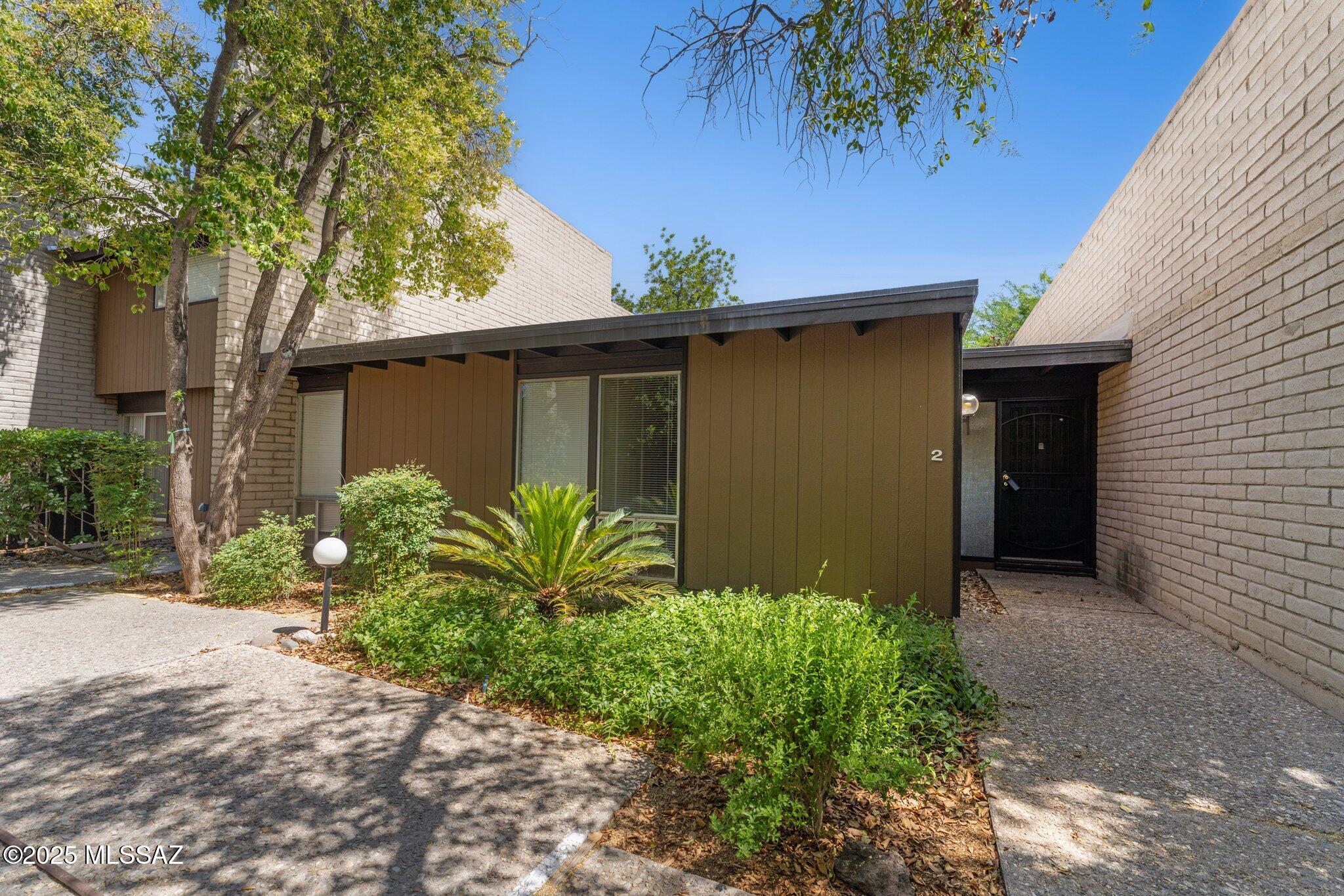 Highly desirable mid-century townhome community centrally located with excellent access to walking / biking on the Pantano section of the Loop. Unit #2 is ideally located with very close to both Fort Lowell Park and the Orchard River community pool and easy vehicle access to Glenn Street. Owner / Agent.
