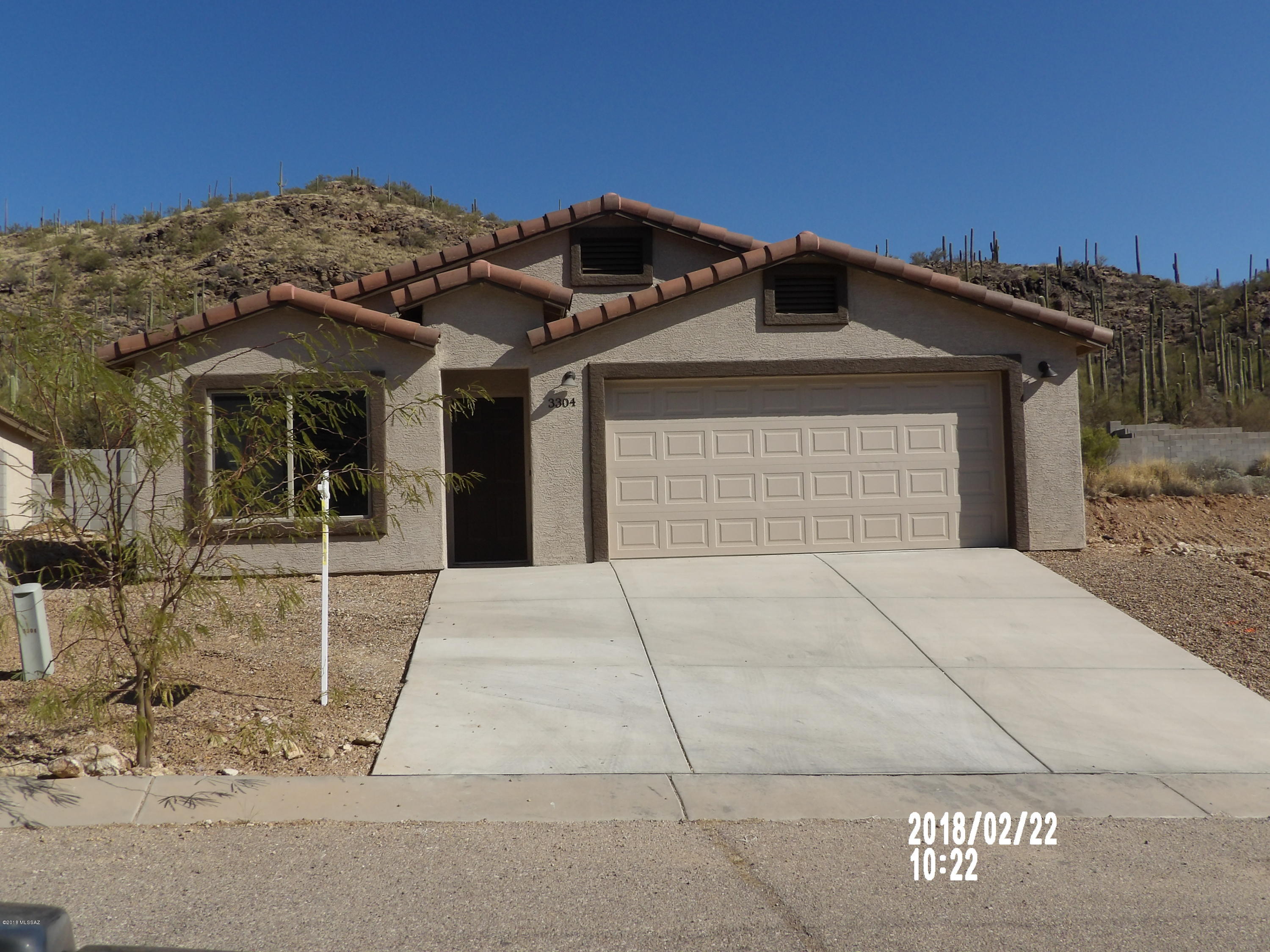 Brand new contemporary style home in Southwest Tucson. Great location with mountain views. Within 5 minutes to an expansive shopping center that includes name brand retailers and restaurants. Features 4 large bedrooms and 2 baths, 2X4 construction with 3/8 OSB furring throughout, 5 TON  14 SEER HVAC unit, R-38 ceiling & R-19 wall insulation, 10' ceilings, wood look ceramic tiles, custom kitchen cabinetry, granite counter tops in kitchen and baths, stainless steel appliances, tile roof and more.....Seller is a licensed real estate agent in the state of Arizona.