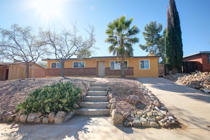 Upgraded and remodeled home boasts tile floors, new ceiling fans, granite counters in kitchen, updated baths, new dual pane windows, fresh paint - in and out, central AC and newer water heater, recently maintained roof, privacy fencing in large yard with POOL, freestanding gazebo on concrete slab. Plenty of off street parking. VIEWS from front. Laundry room big enough for storage or freezer.