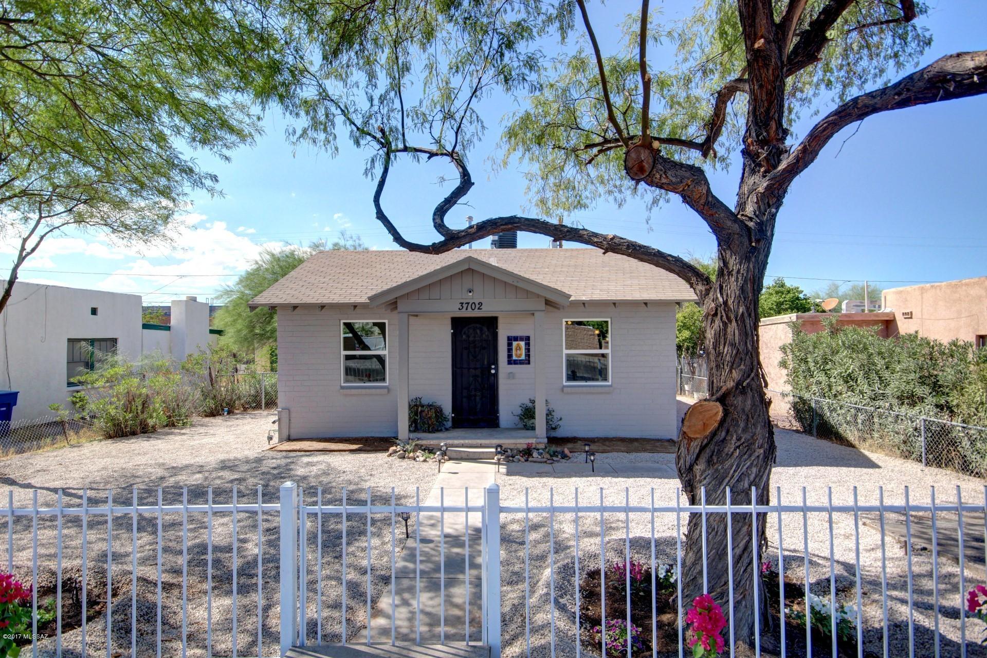 Fantastic remodeled 3 bed 2 bath brick home with detached 4th bedroom for guests. Spacious open floor plan with all new wood laminate flooring & new carpet in all bedrooms. Beautiful kitchen features new cabinets, new granite counter-tops & new stainless steel range hood & new stove and dishwasher & refrigerator. Brand new vanity, mirror & new beautiful tile surround in bathrooms. Master bedroom features master bathroom and two closets. New light fixtures, ceiling fans and door hardware. New dual pane windows installed throughout. Indoor laundry closet for stackable washer and dryer. All new 2 tone interior and exterior paint. Fully fenced yard with covered patio in front & back, automatic drip irrigation with plenty of space in back to make your very own oasis. Come see today!