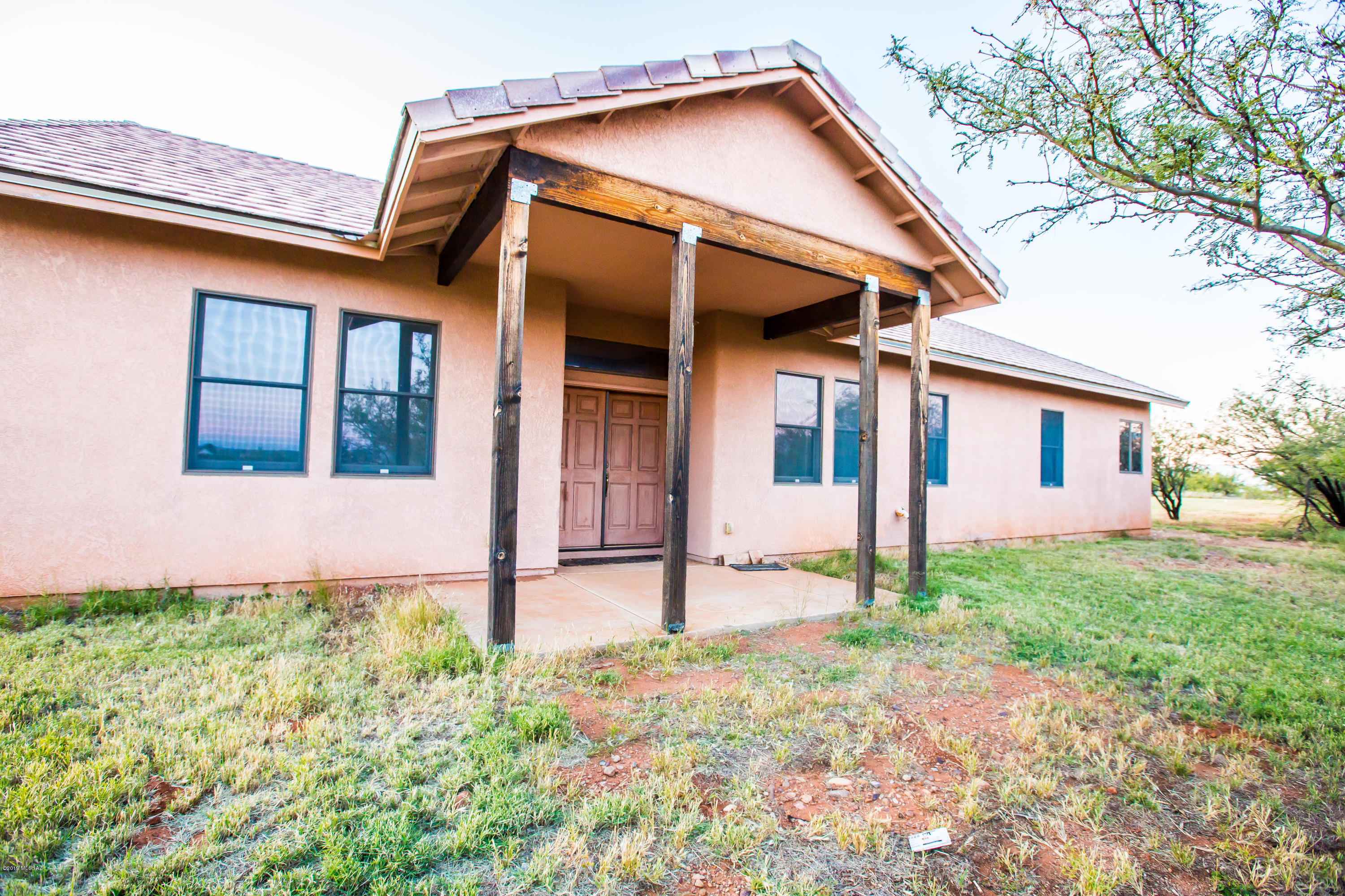 Own a piece of history!Beautiful home sitting on 4 acres complete with an air hanger from the old Hereford AAF. 3bd possible 4 bedroom 2 bath home has been meticulously taken care of by 1 owner. Enjoy the amazing kitchen complete with a 5 burner gas stove, double oven and butlers pantry. Master suite offers 2 walkin closets, soaking tub and 2 vanities in the bathroom. Vaulted ceilings, 2 cooling/heating systems, Anderson tinted windows, solid wood doors and 2 x 6 construction there is so much this home offers. This is a must see, you'll love the mountain views and the natural landscape. Hanger is a 50x50 workshop complete with a 2 ton car lift, air compressor, tool crib, work benches, swamp cooler, and space for whatever you can think of.  Call today for your private showing