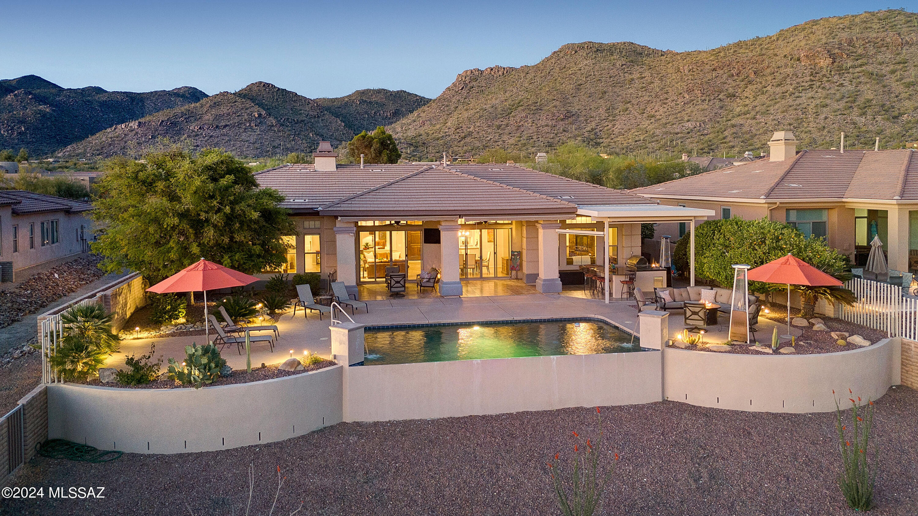 *ENCHANTING HACIENDA* MAGICAL ESTATE PERCHED ON ''THE GALLERY'' GOLF COURSE- OVERLOOKS LUSH FAIRWAY W/INCREDIBLE MTN/SUNSETS VIEWS FOREVER! WELCOMING COURTYARD FILLED W/FLOWERS, SOOTHING FOUNTAIN CREATES A UNIQUE EXPERIENCE FOR YOUR GUESTS! TOLL BROS QUALITY CONST COMBINES CONTEMP LINES W/TASTEFUL SW FLAIR! ''ALL FURNISHINGS'' INCLUDED- JUST MOVE IN! OPEN CONCEPT- GRAND LIVING/DINING SPACES, AMAZING KIT- NEW GRANITE/ LT PAINTED CABS, DUAL FIREPLACES, BAR, SEVERAL SITTING AREAS ALL OPEN TO RESORT STYLE BKYD! DRAMATIC INFINITY POOL/SOLAR HEATED, ALFRESCO KIT/BAR, RETRACTABLE AWNING/SCREENS, TV/MUSIC, COZY FP & BREATHTAKING VIEWS- PARADISE AT HOME! GUEST WING INCL 2 EN-SUITES + MEDIA/REC RM W/PRIV ENTRANCE!  HM OFFICE/DEN. MSTR RETREAT- SPA FEEL, BUBBLING TUB/HUGE SHOWER & DREAM CLOSET!