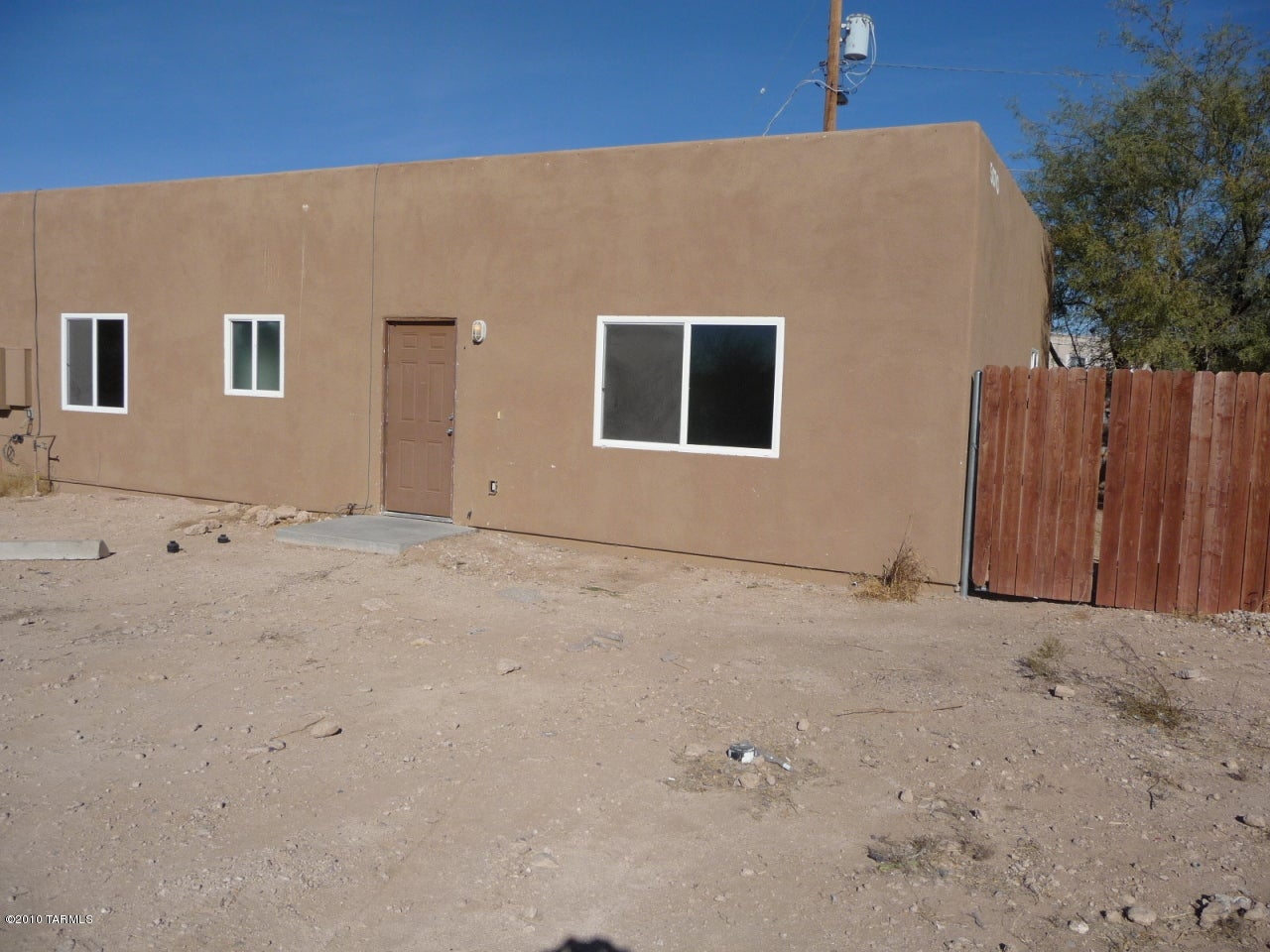 Check out this awesome 3 bedroom 2 bath home! Enjoy the massive backyard, perfect for kids, pets, parties, or quiet evenings on the patio! Updated cabinetry in modern kitchen! Large living areas! Stained concrete floors for easy clean-up. Economically air conditionsed with dual pane windows. Value, comfort, and spacious! This place is perfect for YOU! Call to make your appointment TODAY!!!!