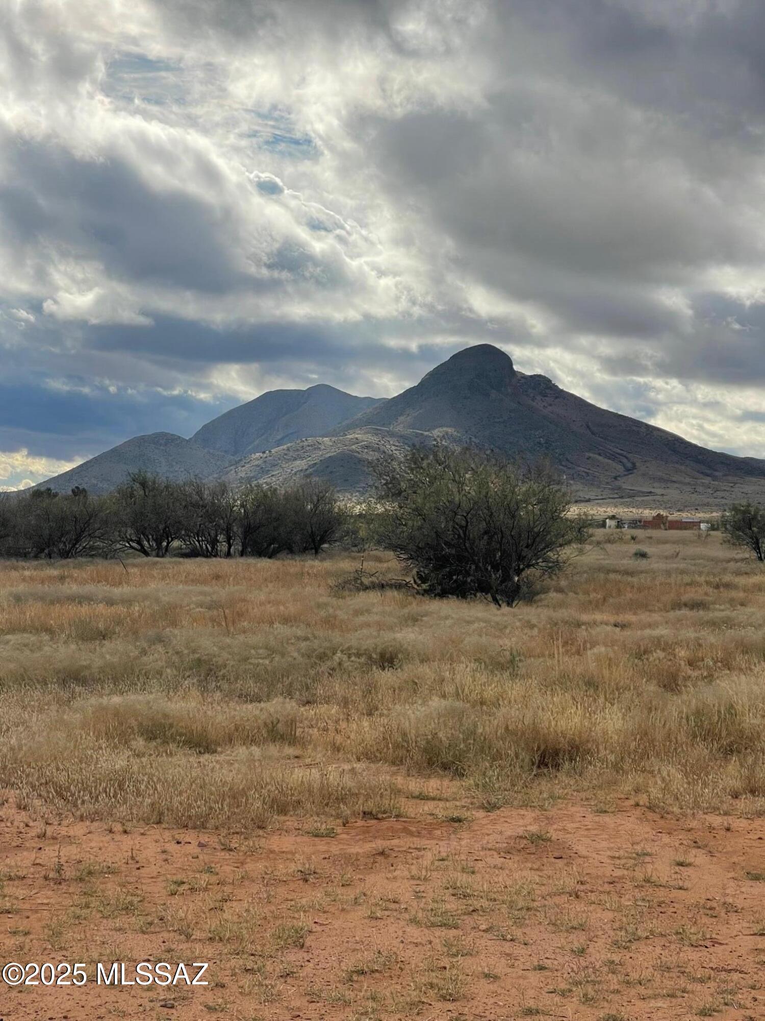 Flat usable 10 ac in Pima county with a well share agreement and power. Property has recently been surveyed and can be split, access from Wagon Rim and Rain Valley Rd. Great  mountain views, some fencing. Mobile, modular, site built or tiny house. parcel is a new split taxes will be calculated for 2026.
Assigned address: 28409 S Rain Valley Rd