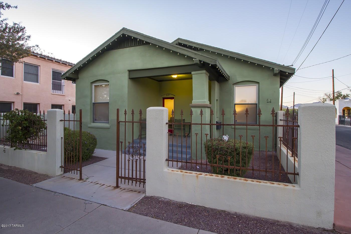 This beautifully renovated 1936 home features a 2 bed, 2 bath owner’s suite complete with custom cabinetry, stainless steel appliances, a separate office area, a sliding barn door, hardwood floors, modern lighting, soaring ceilings and lots of windows with tons of natural light. The spacious 1 bed, 1 bath guest house with separate entrance offers many of the same modern touches including custom cabinetry, a stainless steel backsplash, huge pantry and all appliances included. The C3 Zoning makes this the ultimate Live/Work property, or live in one and rent the other unit with 4 parking spaces giving you plenty off street parking! All within Tucson’s historic Iron Horse district, just steps away from 4th Ave shopping, Congress nightlife and a short streetcar ride away from the UofA!