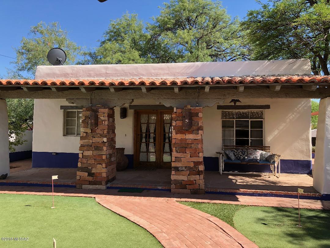 You'll fall in love with this charming, gated, Spanish style Casita located in the heartbeat of Tucson.  It's not only right off the Mountain Rd. bike path but within walking distance to Banner Hospital, U of A and all amenities.  This 1BR/1BA Casita is completely furnished (just bring your clothes) and welcomes you with beam ceilings, flagstone floors, Mexican tile in Kitchen/Bath and gorgeous, shaded front and rear patios. The separate laundry room has plenty of room for storage.  Rent includes Internet, Water, Trash, Sewer and ADT Security. Come and experience the Privacy, Charm, Space and Convenience of having your own separate furnished home. Main 3BR home also available separately or as a package with this Casita. See MLS #21819726