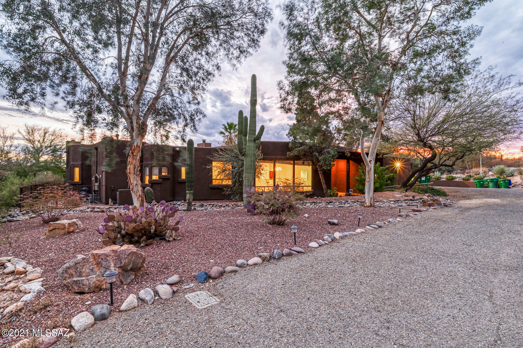 Welcome home to your private oasis with a wonderful split floorplan nestled in mature shade trees at the end of the street. Enjoy the heated, negative edge pool and spa overlooking downtown Tucson! Four bedrooms plus a den/office allow for plenty of options. Ideally located in north central this gem won't last long. Available for quick closing!