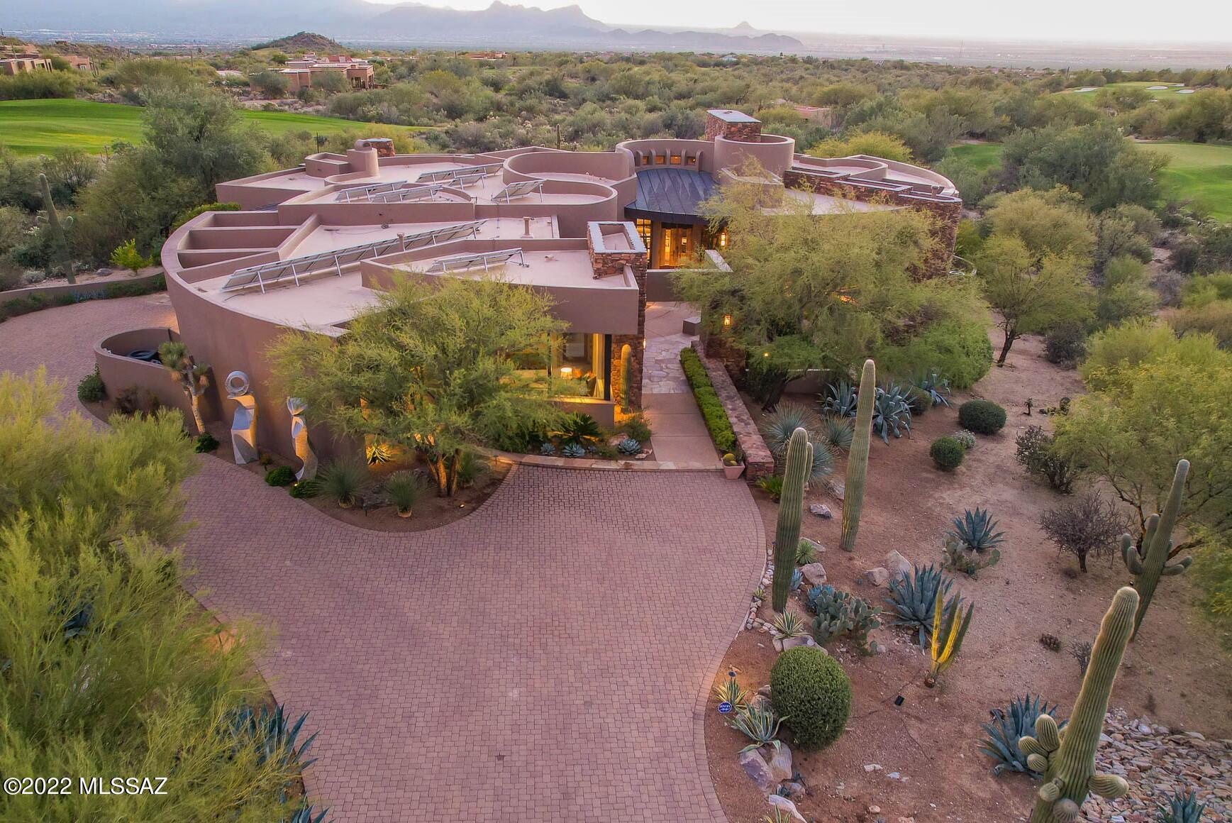 SENSATIONAL SOUTHWEST CONTEMPORARY BY AWARD WINNING ARCHITECT KEVIN HOWARD. PREMIUM LOCATION SURROUNDED BY RUGGED SONORAN DESERT & LUSH FAIRWAYS OF GALLERY GOLF CLUB'S NORTH COURSE. INCREDIBLE CONTEMPORARY DESIGN   BLENDS LINEAR/CIRCULAR THEMES, MODERN & NATURAL FINISHES. STUNNING MASONRY STUCCO CONSTRUCTION CREATIVELY ACCENTED BY WALLS OF STONE. CURVED WINDOWS CAPTURE PANORAMIC SUNSET, MOUNTAIN RANGE & EPIC SONORAN DESERT SCENES. GORGEOUS BACKYARD W/ STONE FIREPLACE, BBQ KITCHEN, NEGATIVE EDGE POOL/SPA & MULTIPLE VIEW PATIOS. ELEGANT INTERIOR DESIGN BY LORI CARROLL. EMBRACES TODAY'S LIFESTYLE W/ SPACIOUS GUEST CASITA & GRAND OFFICE W/ UNFORGETTABLE VIEWS. MODERN, OPEN FLOORPLAN W/ ELEGANT LIVING SPACES. 4 FIREPLACES, 3.5-CAR GARAGE. LOCATED IN CANYON PASS ''VAQUERO'' THROUGH THE 2ND GATE