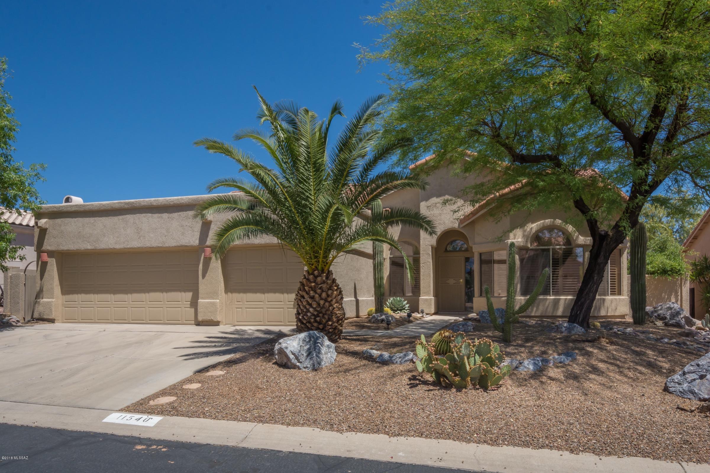 Immaculate 4BR, 2BA home with spectacular golf course and mountain views. Open sunny floorplan with designer touches. The kitchen has granite countertops, large island with breakfast bar, stainless steel appliances, tons of cabinet space as well as a big pantry. The living room/ dining room are open and airy and the family room has a cozy gas fireplace. The master bedroom has beautiful views and is roomy with a terrific ensuite bathroom complete with a large soaking garden tub and separate shower. There are three other bedrooms and one could even be used as a den/office. Don't miss seeing this gem of a home in the heart of Oro Valley! BBQ and Pond feature are ''as is''.