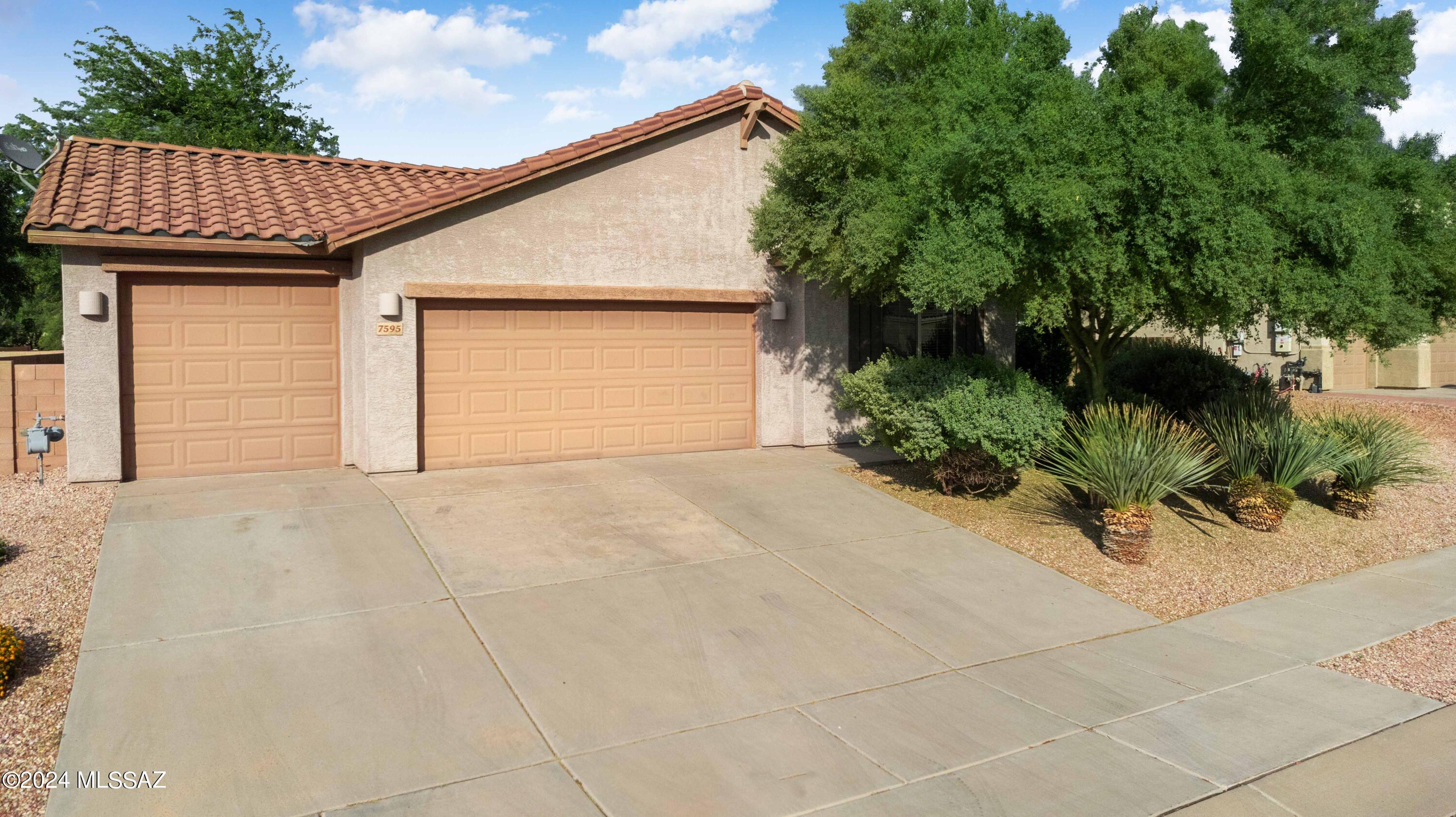 Beautiful energy efficient Lennar home is a ''Next Gen'' home that sits on a Large Lot. It measures 80' across the front! Mature trees and vegetation offer privacy.   Separate suite with Private Entrance, Bedroom, Full Bath
with Laundry closet.Unit has separate temperature control. Perfect for a Blended Family or Rental Income. This well maintained home offers lovely painted walls that add to the ambiance. Gorgeous Backsplash in Kitchen. Executive Height Maple Cabinets with Crown Molding, Granite Counters and Extended Pantry are a few of the Kitchen features. Large Primary Bedroom offers En-Suite Bath with Dual Sinks. Even the Hall Bath has Dual Sinks. HVAC System has been meticulously maintained.