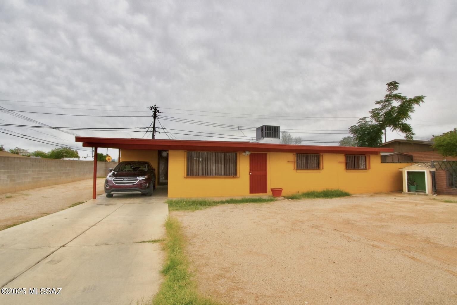 Beautifully maintained 3-bedroom, 2-bath home on a spacious corner lot! This property offers room for custom landscaping, outdoor living, and/or RV parking. No HOA! Inside, you'll find a comfortable layout with well-kept interiors. Conveniently located near schools, shopping, and everyday amenities, with easy access to major roads,just 20 minutes from the University of Arizona. A great opportunity for anyone seeking comfort, space, and affordability!