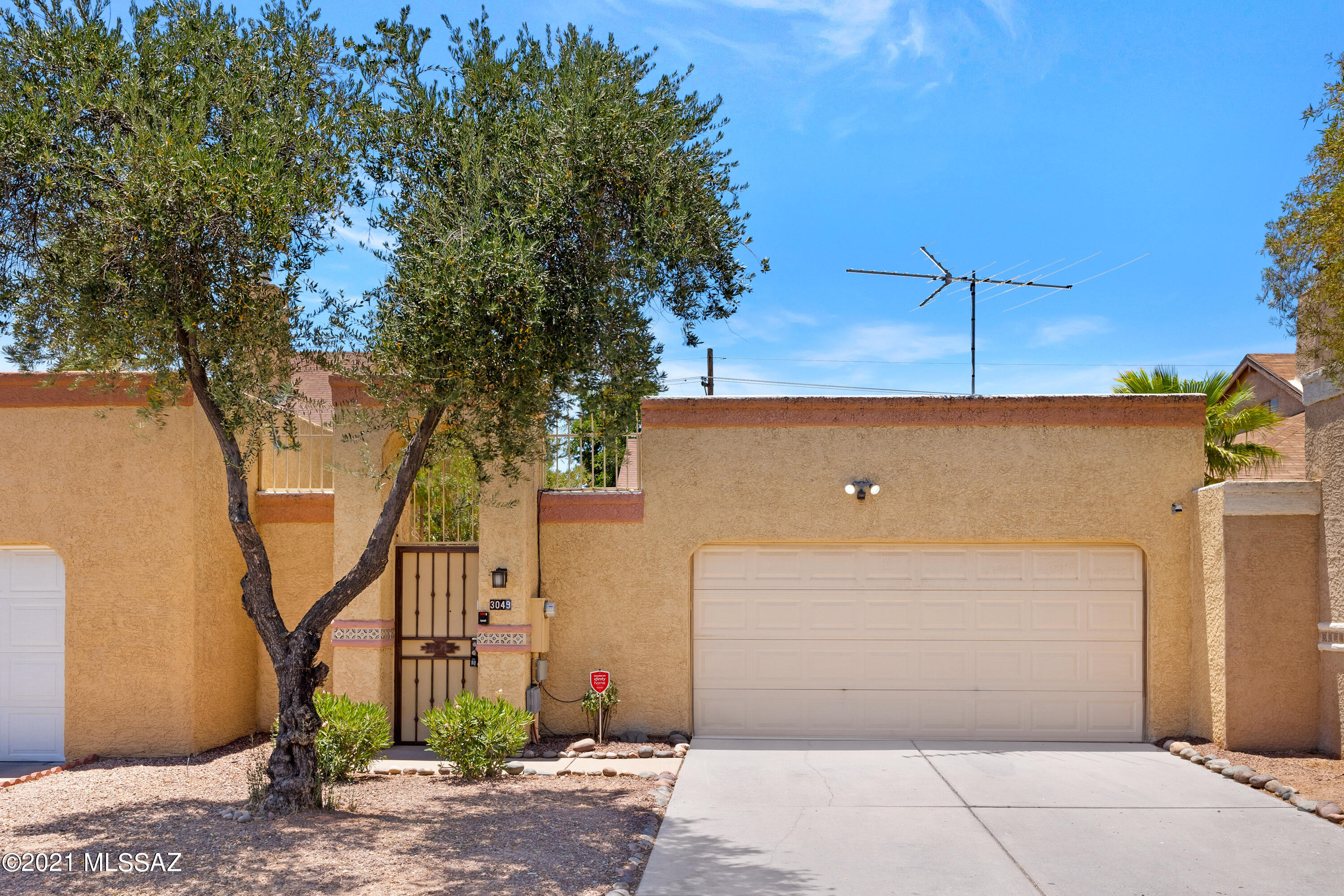 Welcome home! This charming 2 bedroom, 2 bathroom Townhome showcases vaulted ceilings, neutral paint, tile and plush carpet throughout! The home has a nice sized living room and the kitchen showcases ample cabinet space, matching appliances, a pantry and an island with a breakfast bar. Each of the bedrooms are amply sized and have plenty of closet space! Outside, there is a nice yard with well-maintained trees and shrubs! This townhome would be a great place to call your own or an excellent investment opportunity! The community features a park, sports court and a pool! Your new home is conveniently located nearby large parks, freeway access and schools! Don't miss out on this wonderful Townhome! Schedule your showing today!