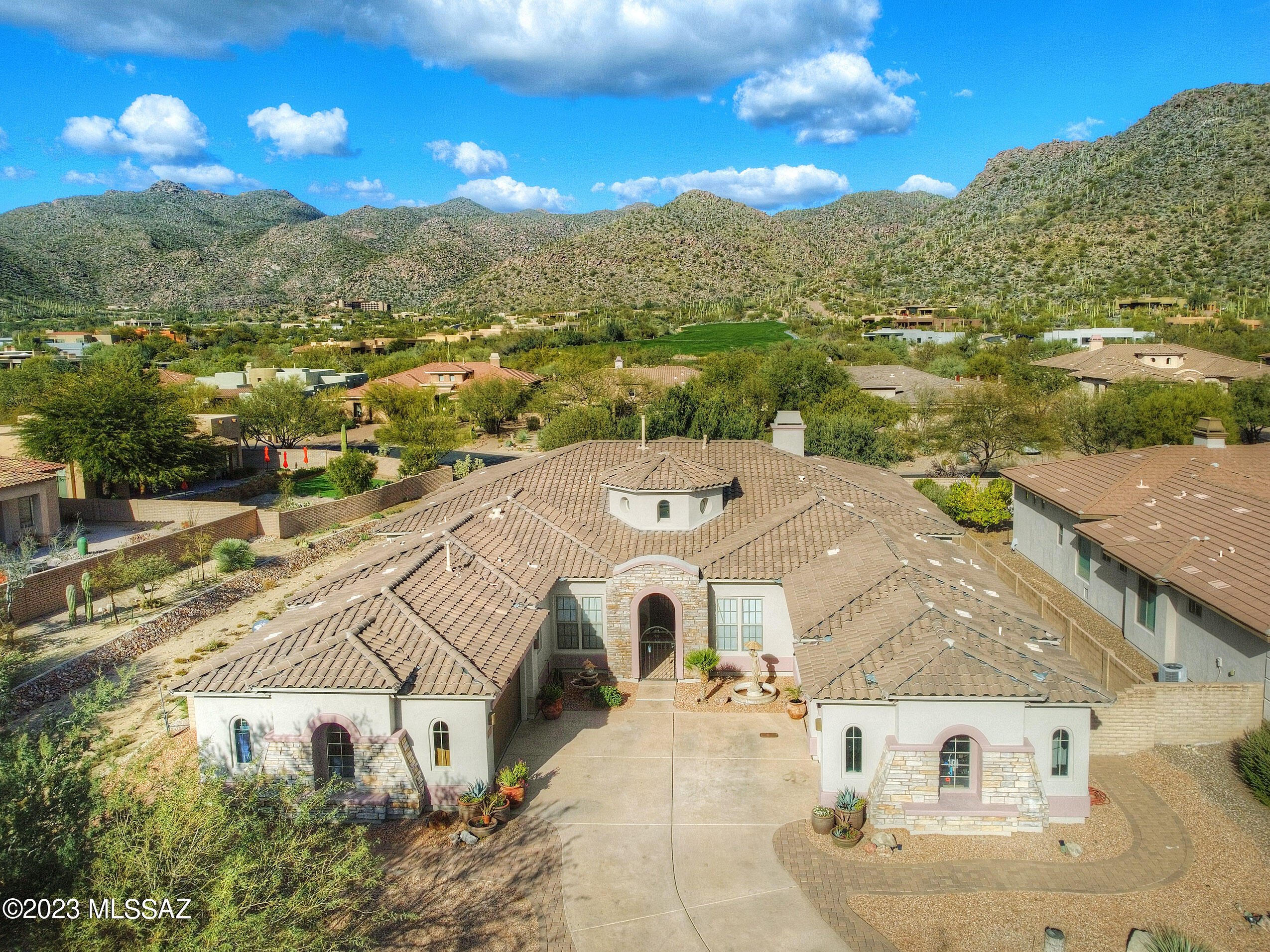 200K remodel recently completed on this already gorgeous Toll Brothers home in the highly desirable community of The Gallery in Dove Mountain. Gourmet kitchen with quartz counters, island & breakfast bar, gorgeous cabinetry, Dual gas range/oven with custom vent hood, stainless appliances, and breakfast nook. Sprawling great room with bright windows, cozy fireplace and exit to the patio. Master En suite with dual vanity, jetted tub & separate shower. Cathedral ceilings throughout, with Toll Brothers ceiling insets to define space but remain open. Attached casita has private access & separate garage.  Do not miss this beauty!