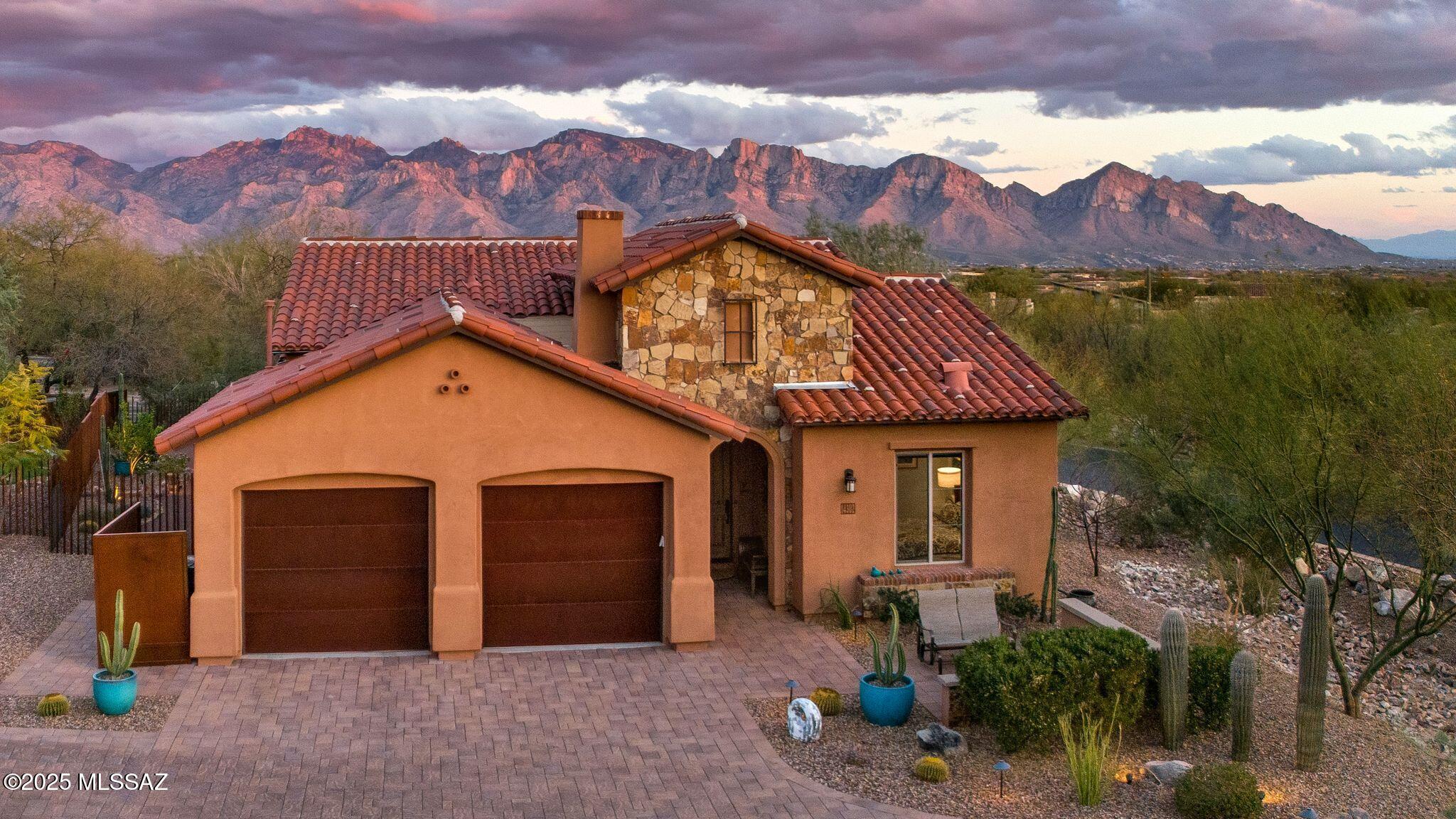 Located in the prestigious Stone Canyon community, this exceptional Golf Casita a rare blend of luxury, privacy, and breathtaking natural beauty. Designed for both comfort and entertainment. Don't miss this opportunity to own a piece of Stone Canyon luxurywhere every day feels like a retreat.Unrivaled views of the Catalina Mountains, framed by towering saguaros and the serene desert landscape, create an awe-inspiring backdrop for everyday living.
Stunning Catalina Mountains, VIEWS!  This fully furnished Golf Casita offers 1942 sq.ft. A luxury resort lifestyle with three bedrooms, three baths, and inviting spacious outdoor living area.  Great room with vaulted ceilings, kitchen island overlooking living room dining area, gas fireplace, wine & beverage bar. Each bedroom is strategically located so every guest has privacy.
Meticulously designed, well-manicured side and back yards with privacy fencing,  
Jacuzzi, water feature, and firepit - an entertainer's dream. A short walk from the  Stone Canyon Clubhouse and Health & Fitness Center, this residence places you at the heart of a world-class golf community that embodies an unparalleled lifestyle.
