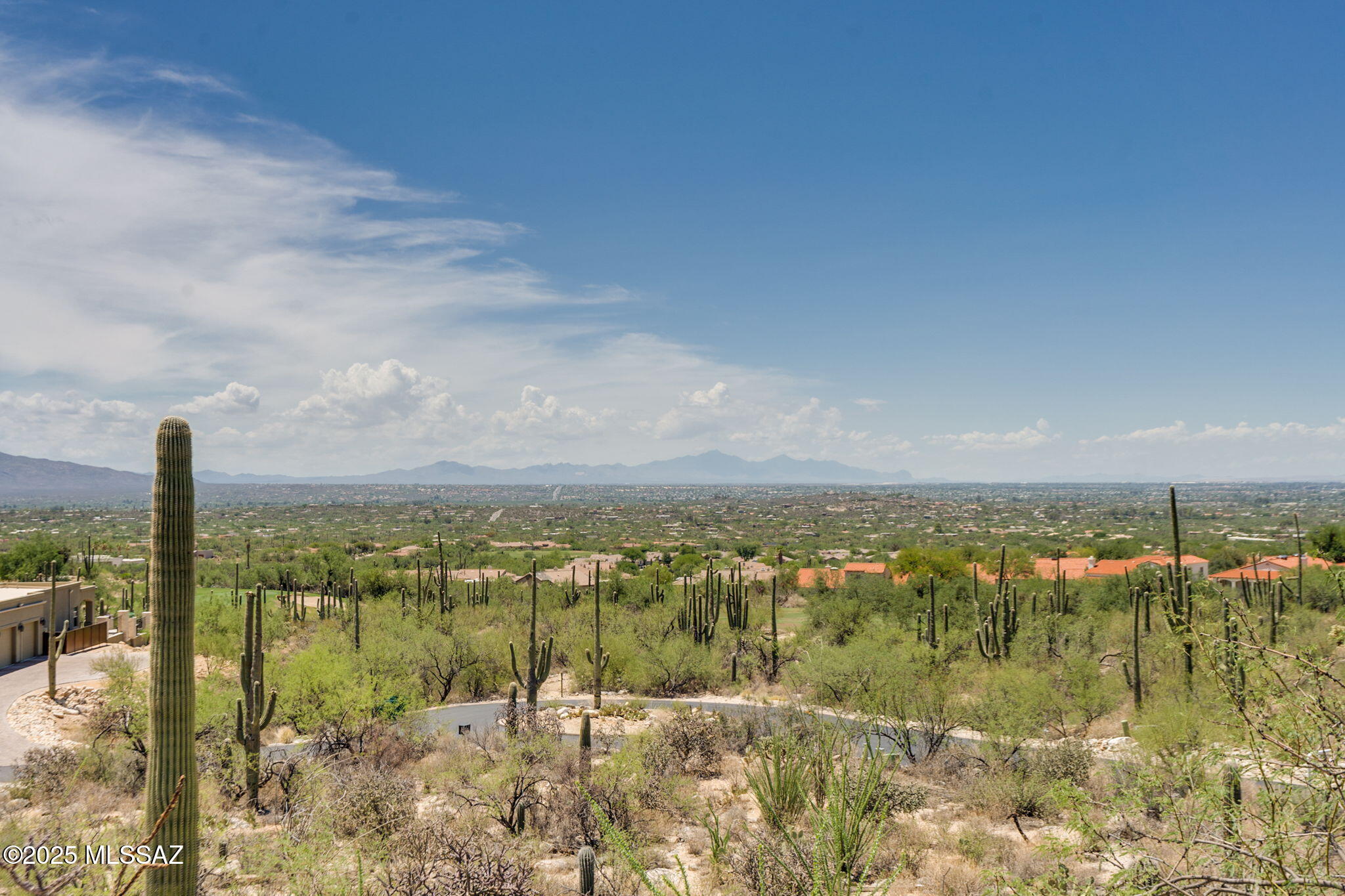 Seller will entertain offers between $150,000 - $165,000. An amazing price for an exceptional custom homesite within the prestigious Sabino Estates, an exclusive enclave nestled inside the guard gated Sabino Springs, home to the AZ Nat. Golf Course. Ideally situated at the base of the majestic Catalina Mountains, the lot is framed by towering saguaros, offering a truly striking natural backdrop. Breathtaking 360 degree panoramic views encompassing the mountains, glittering city lights, and spectacular AZ sunsets. This unique property provides unparalleled seclusion & quiet enjoyment, allowing for a custom home designed in perfect harmony with the serene desert landscape. This rare offering presents an extraordinary opportunity to create your dream home amidst unparalleled beauty & privacy.