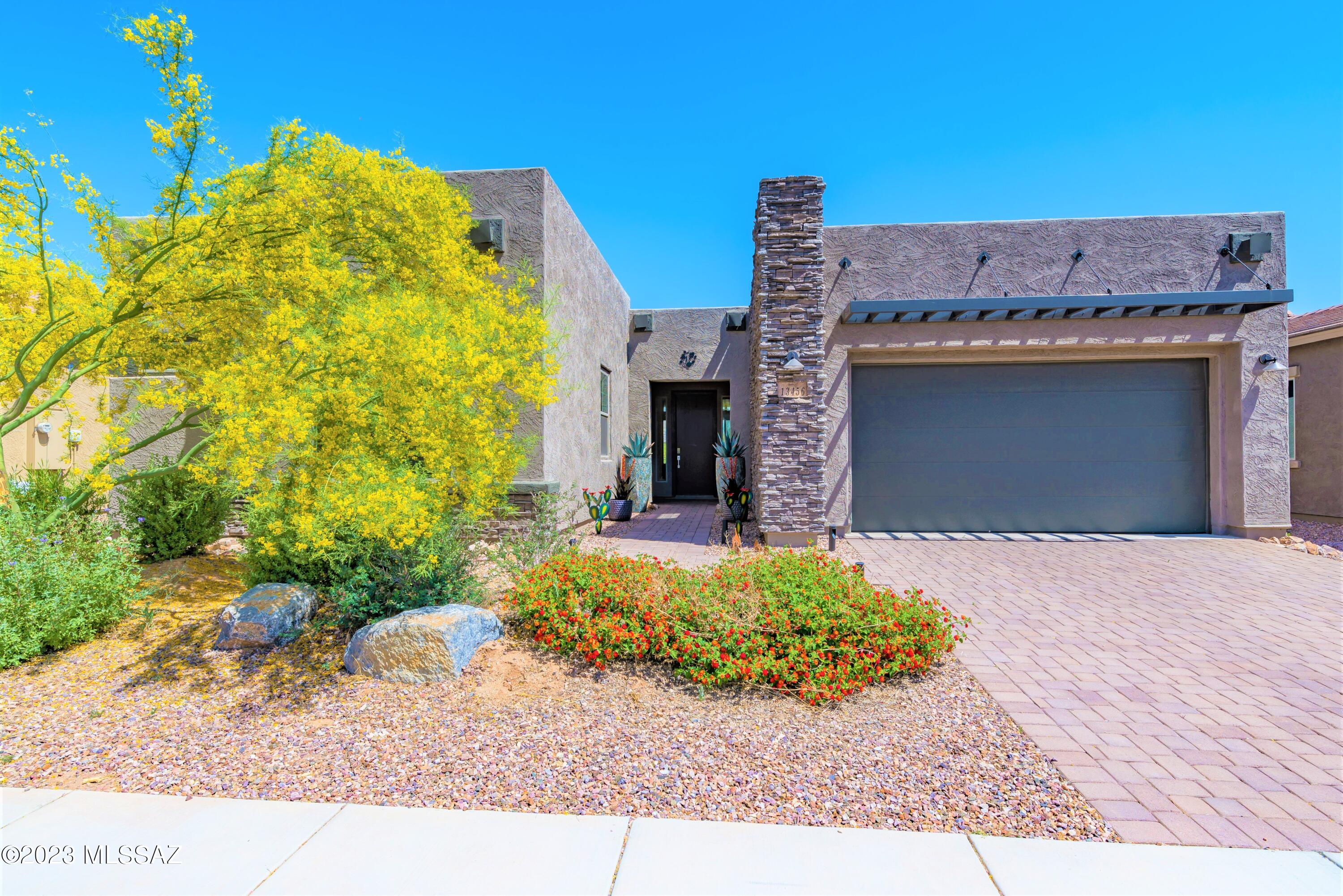 Gorgeous Home in Rancho Vistoso's Gated Alterra at Vistoso Trails Neighborhood. This Bright, Open Patina Model boasts Spectacular Catalina Mountain Views! Enjoy your 2,346 sq. ft. home w/ 3BR, 2.5 Baths & Large Office. Owner's Suite features Fabulous Walk In Shower, Dual Sink Vanity, Walk in Closet and Laundry Room Entryway. Your Large & Lovely Great Room features Gourmet Kitchen w/ XL Center Island, Pantry, Granite Countertops, Pretty Tile Backsplash that is Open to Dining Area & Family Room w/ 12' Center Slider and Catalina Mtn. Views! Relax and Enjoy your Rear Yard Oasis backing to Open Space, complete w/ Heated Pool, Spa, Travertine Tile, Charming Firepit, Artificial Turf and Covered Patio w/ Fan. Plus a 3 Car Tandem Garage. This Wonderful Home has it All!