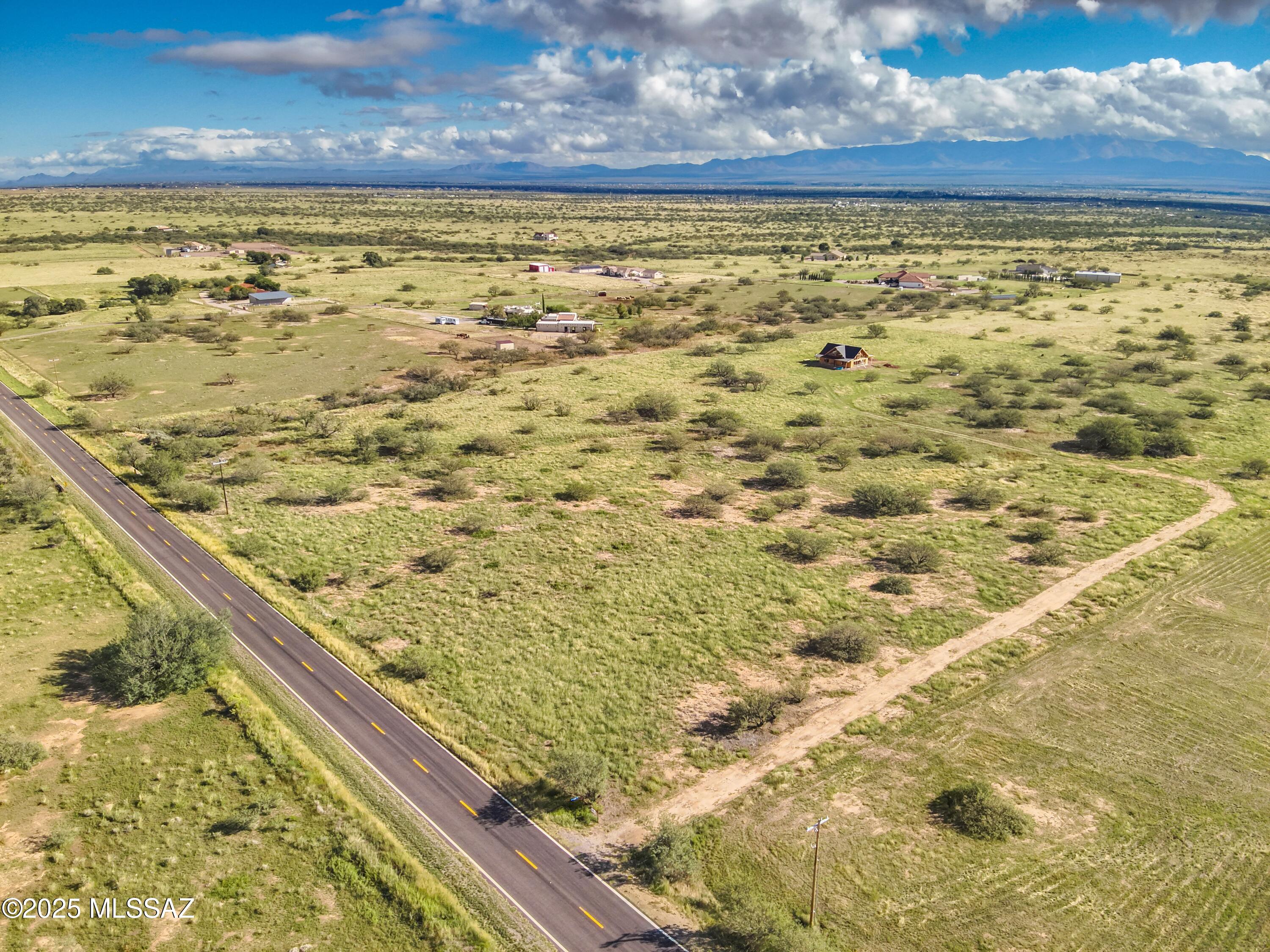 Create your ideal homestead on this scenic 4.01-acre parcel in Southern Arizona, zoned RU-4 for greater building flexibility and freedom. With paved road frontage and both legal and physical access, getting to the property is simple and reliable. Power is already on-site, reducing time and cost as you plan your build. Enjoy breathtaking views of the Coronado Mountains, just minutes from the Coronado National Memorial and Coronado Cave—perfect for hiking and outdoor exploration. Site-built homes are required, preserving the charm of the area. Horses and livestock are allowed with proper fencing. Located about 15 miles from Sierra Vista and 20 miles from Bisbee, this property offers the perfect blend of privacy, convenience, and possibility in a peaceful rural setting.