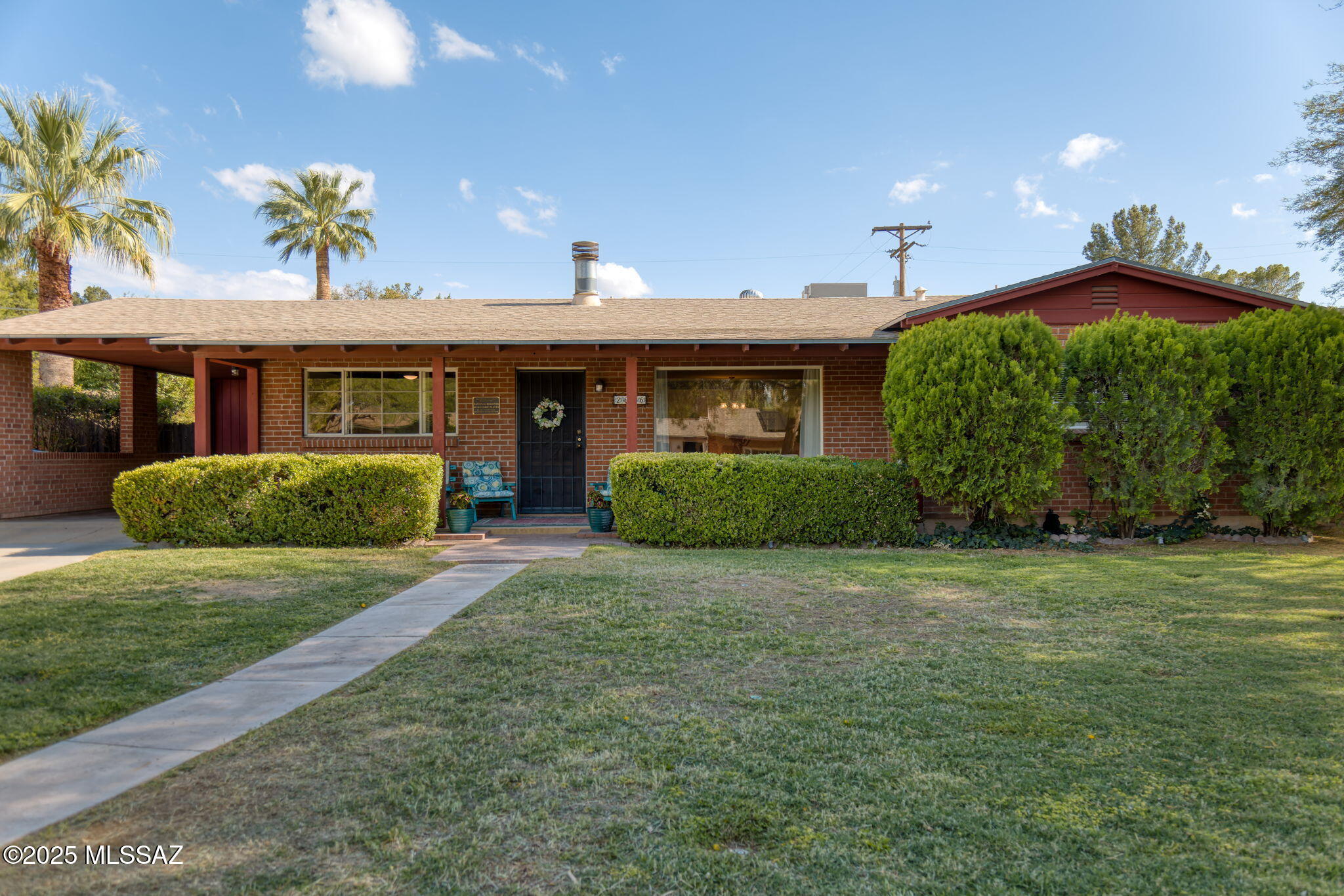 Nestled in the heart of Winterhaven, this 1951 mid-century charmer invites you into a life of comfort, connection, and character. Listed on the National Historic Register, this well-loved home offers Catalina & Finger Rock views from the covered front porch and mid-century details throughout, including original tile in both bathrooms and a square soaking tub. The upgraded kitchen has all the bells and whistles: oak cabinetry, Corian counters, GE Profile appliances, and even a pot filler. A large family room with surround sound and lush garden views is ideal for everyday living and entertaining. Relax in the screened porch with hot tub and TV, grow your own veggies in raised beds, or let the tortoises roam in the fully fenced yard. Large storage shed and space for raising your own chickens The Winterhaven neighborhood is more than just a place to live, it's a true community. Known for its tree-lined streets and the famed Festival of Lights that attracts visitors from across Tucson and supports the local food bank, Winterhaven also hosts numerous neighborhood events throughout the year just for residents.
Conveniently located near Brandi Fenton Park, the Tucson Racquet Club, a variety of shops and restaurants, and with easy access to the 130-mile Loop bike path, this location truly has it all. HOA fee of $85 includes water (private well for the community) and trash. This unique and well-loved home offers the perfect blend of history, comfort, and community. Come experience the magic of Winterhaven and this home that is ready to welcome you.
