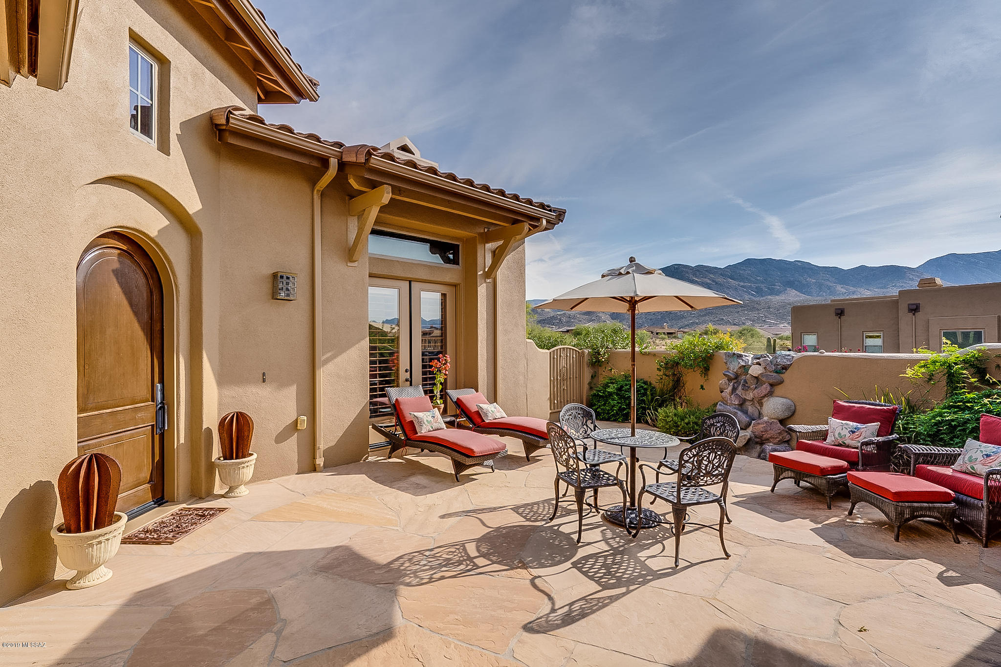 Exquisitely appointed Sonoran model with magnificent mountain & golf course views in The SaddleBrooke Preserve! Front courtyard entry w/custom designed wrought iron gates, flagstone flooring, water feature & entry to fully appointed guest casita. Large Great Room boasts unique floor medallion, gorgeous custom FP, wet bar & walls of windows to large patio area & pool. Stunning kitchen features granite counters, knotty cherry cabs, high end apps, tiled backsplash, pendant lighting, extended island & Butlers Pantry. Spacious Master Suite includes en-suite bath w/walk thru shower, separate his/hers areas & huge closet! Other features include Plantation Shutters, Alder doors throughout, new exterior paint & new drip sys w/ landscaping featuring numerous Saguaros. This is a MUST SEE Home!