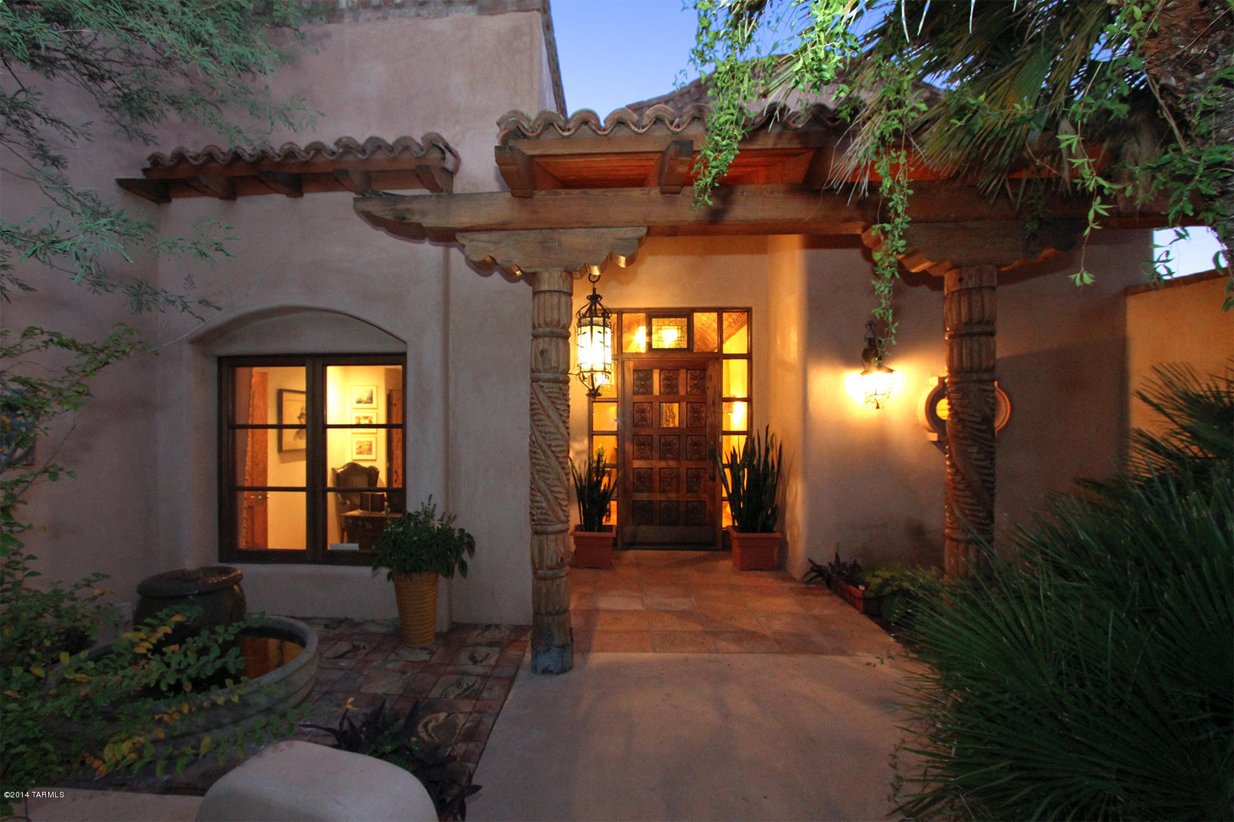 Range pricing $1,200,000-1,350,000. SERENELY PEACEFUL AND SECLUDED DESCRIBE THE SETTING FOR THIS ONE-OF-A-KIND MEXICAN HACIENDA ON 3.3 ACRES IN NORTHEAST TUCSON. THE LONG DRIVEWAY AND GATE FEELS LIKE ENTERING YOUR OWN PRIVATE RESORT. FROM YOUR FIRST STEP THROUGH THE HEAVY WOODEN DOOR SURROUNDED BY ANTIQUE GLASS TO THE CURVED BOVEDA CEILING OF THE ENTRY HALL AND INTO THE GALLERY WITH LIGHT FIXTURES FROM SAN MIGUEL de ALLENDE, CARVED POSTS FROM MEXICO RISING UP TO THE HEART OF LONGLEAF PINE BEAMS FROM NEW ORLEANS COTTON WAREHOUSES, YOU WILL MARVEL AT THE ATTENTION TO DETAIL IN THIS HOME. FLOORS ARE 22'' SAUTILLO TILES MADE FOR THIS HOME. ONE GUEST BATHROOM IS A VIRTUAL MUSEUM OF TILES FROM PORTUGAL, SPAIN & ITALY. THE KITCHEN FEATURES A CARRERA MARBLE ISLAND,AS WELL ADDITIONAL COUNTERS IN ZINC FOR DURABILITY.  UNUSUAL TREATMENTS OF TILE, CABINETS, LIGHT FIXTURES AND THE STUCCO WALLS THROUGHOUT DEVELOP THE "HACIENDA" FEEL INSIDE THIS HOME.  YOU HAVE TO VISIT THIS SPECIAL PROPERTY TO SOAK UP THE TOTALITY OF THE DETAILS THAT CANNOT BE DUPLICATED.
