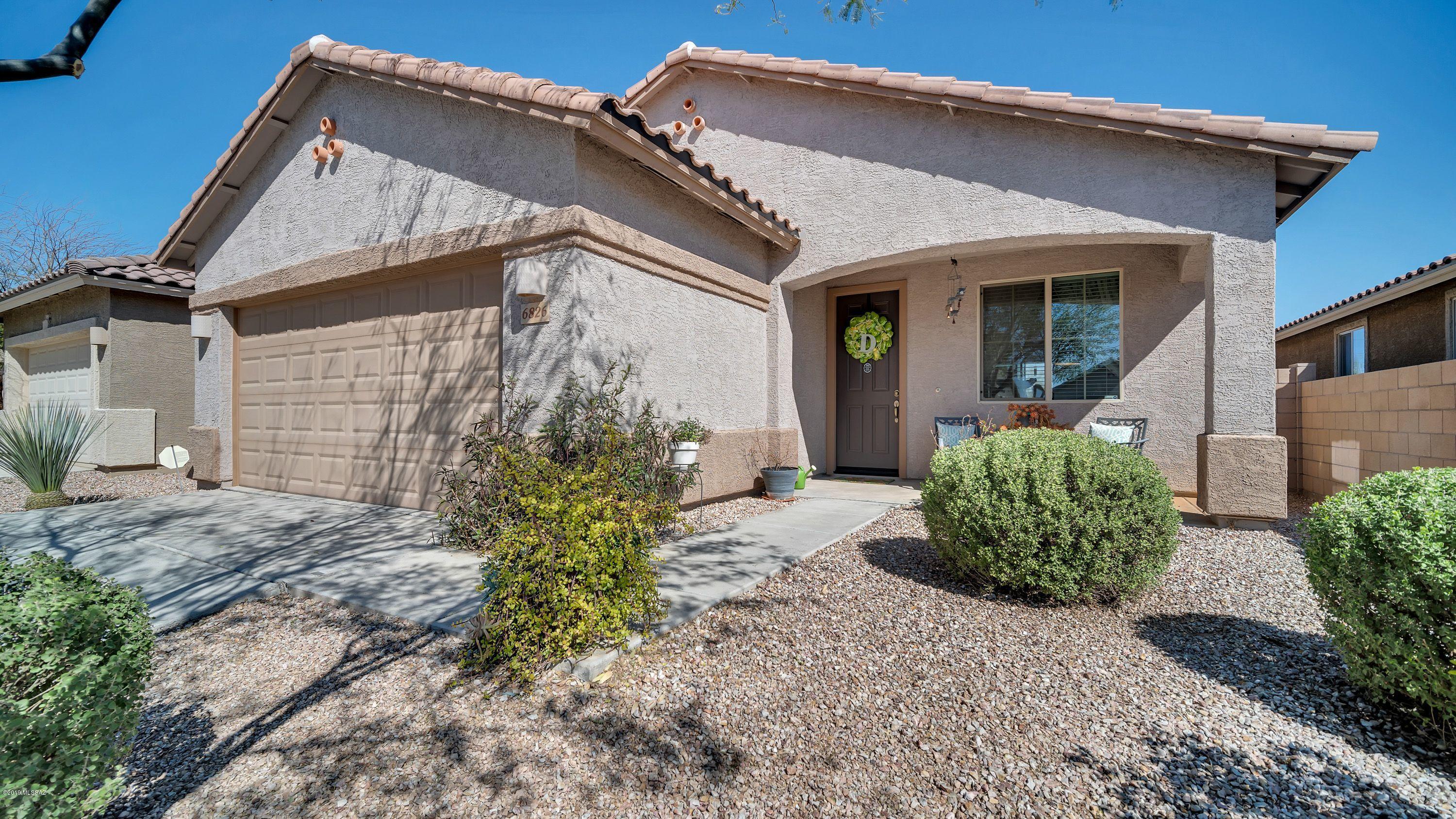 Well maintained home on a premium lot with north/south exposure and mountain views from your back yard. Very open and bright floor plan with a tasteful color palette. The owner has already put in a herb/vegetable garden so you can have your own ''farm to table'' cuisine in the open kitchen. The master plan has parks, ball fields, and walking path to enjoy. This location offers easy access to the airport area. Interstate 19 and 10 and all points E, N, and S. This home will not last at this price and condition. Ready to move into.