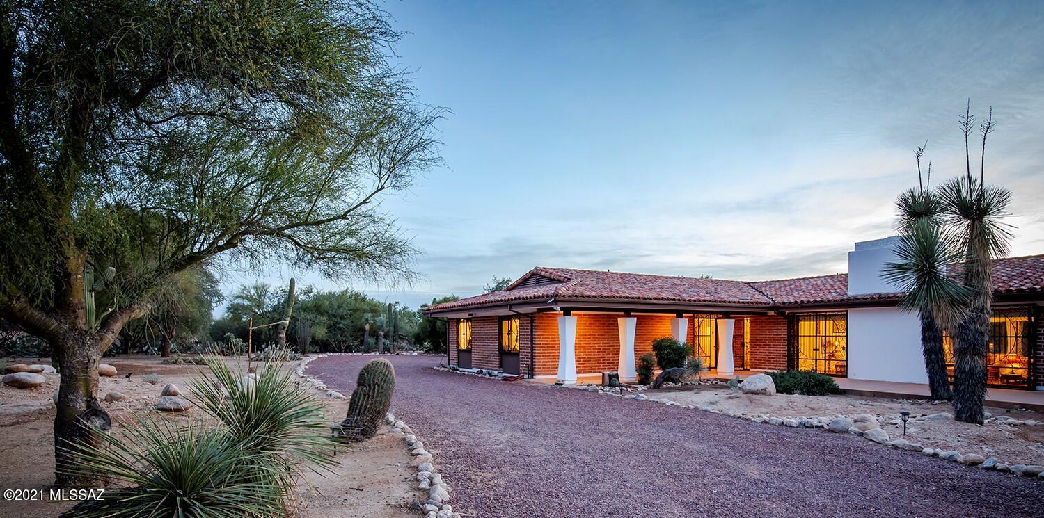 Coveted Casas Adobes Stunner-Significant architectural work by Tucson Icon Edward Nelson,  1918-2018. Ned's work helped shape mid 20th century Tucson's architectural landscape! His major projects won awards & received national attention. MCM home on almost 1.5 acres is in immaculate condition & retains beautiful vintage original features that have been preserved & enhanced w/ new modern kitchen appliances & beautiful hard wood flooring along w/ new cork flooring installed in '18.  Massive light-filled spaces w/ floor to over 9 ft ceiling windows that open to screened-in lanais wrapping the entire west side of home-everything you want including a beautiful pool w/mineral system & flagstone surround, + large garage w/workshop, no HOA! See full list of improvements + more>> 58/100 Walk Score! Close to so much shopping and conveniences, businesses and eateries!  

More on the architect:  Among his work and in addition to custom homes, Ed Nelson contributed to 6 of the 50 most significant Mid Century Modern commercial buildings in Tucson.
The architect received 4 AIA Western Mountain Region Merit awards, which is a 6 state area, for his work.
He was the founding Partner at CNWC (Cane Nelson Wares Cook) Architecture Firm.

(List of improvements in DOCUMENTS Tab)