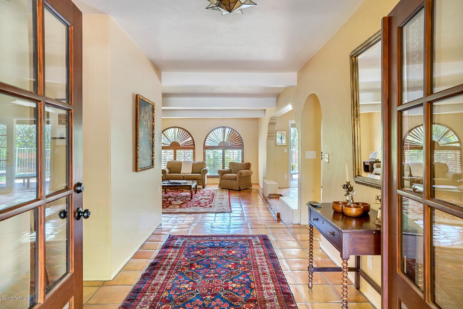 Tucked back in a  quiet cul-de-sac in Sabino Vista Hills. This home has privacy and a beautiful setting. Updated and upgraded throughout. You will love the entertainer's kitchen with new cabinets, granite counters, and stainless appliances. The kitchen is bright and open and has a  lovely breakfast area. Adjacent to the kitchen is a large family room that opens to the pool and spa. A very spacious master suite with a fireplace provides a peaceful retreat. This property has an beautiful lot and ideal location in one of Tucson's most desirable neighborhoods. To top it off the neighborhood offers a community pool and tennis courts.  This truly is a must see.