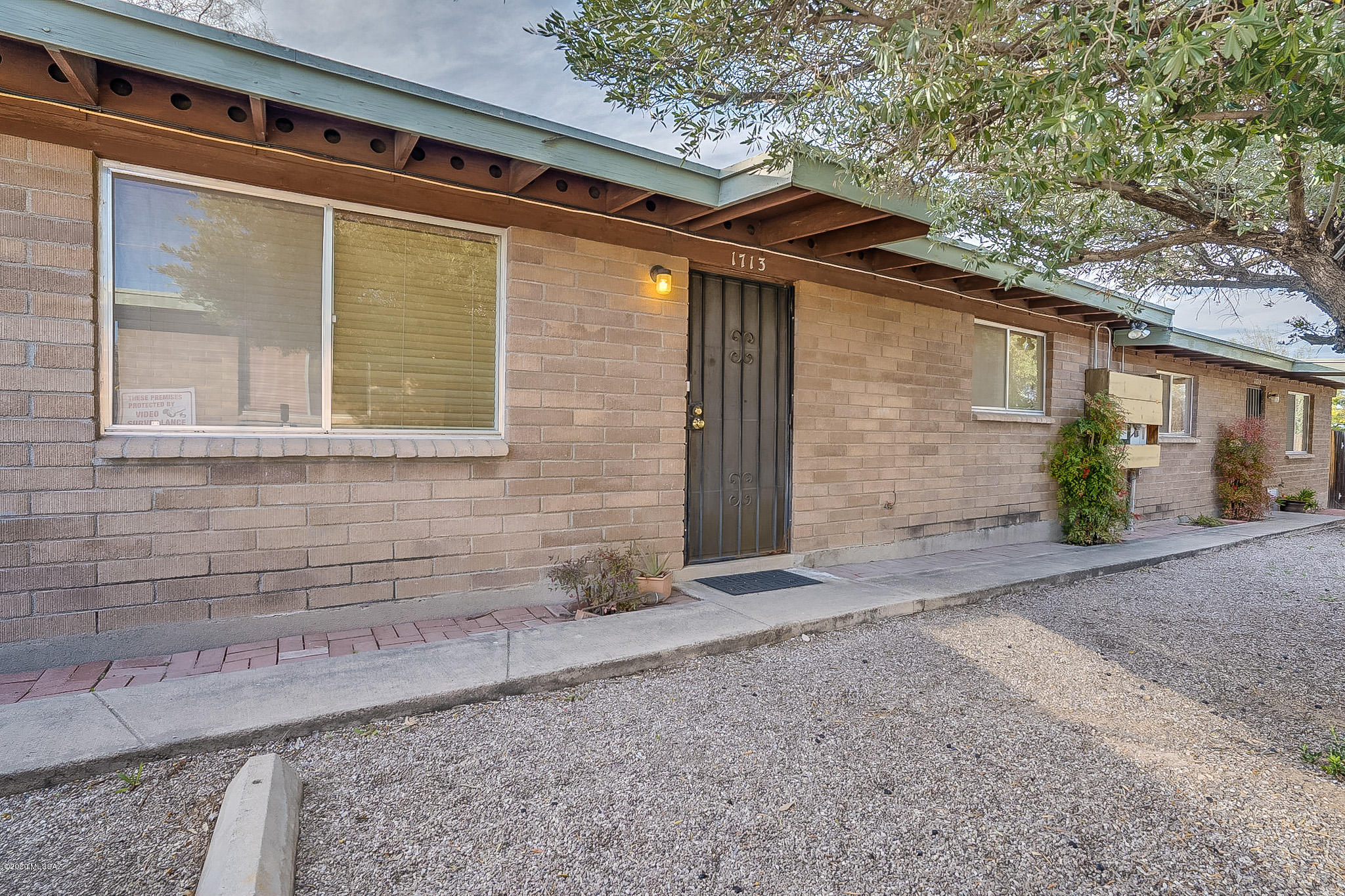 Well maintained Garden Style  Multifamily 4-Plex.  Each 892 sq. ft. unit features two bedrooms and 1 bath. Electric and gas are on separate meters.  Refrigerator, washer and dryer included with each unit. Property is fully occupied. Conveniently located near the U of A, stores, shopping and dining.
