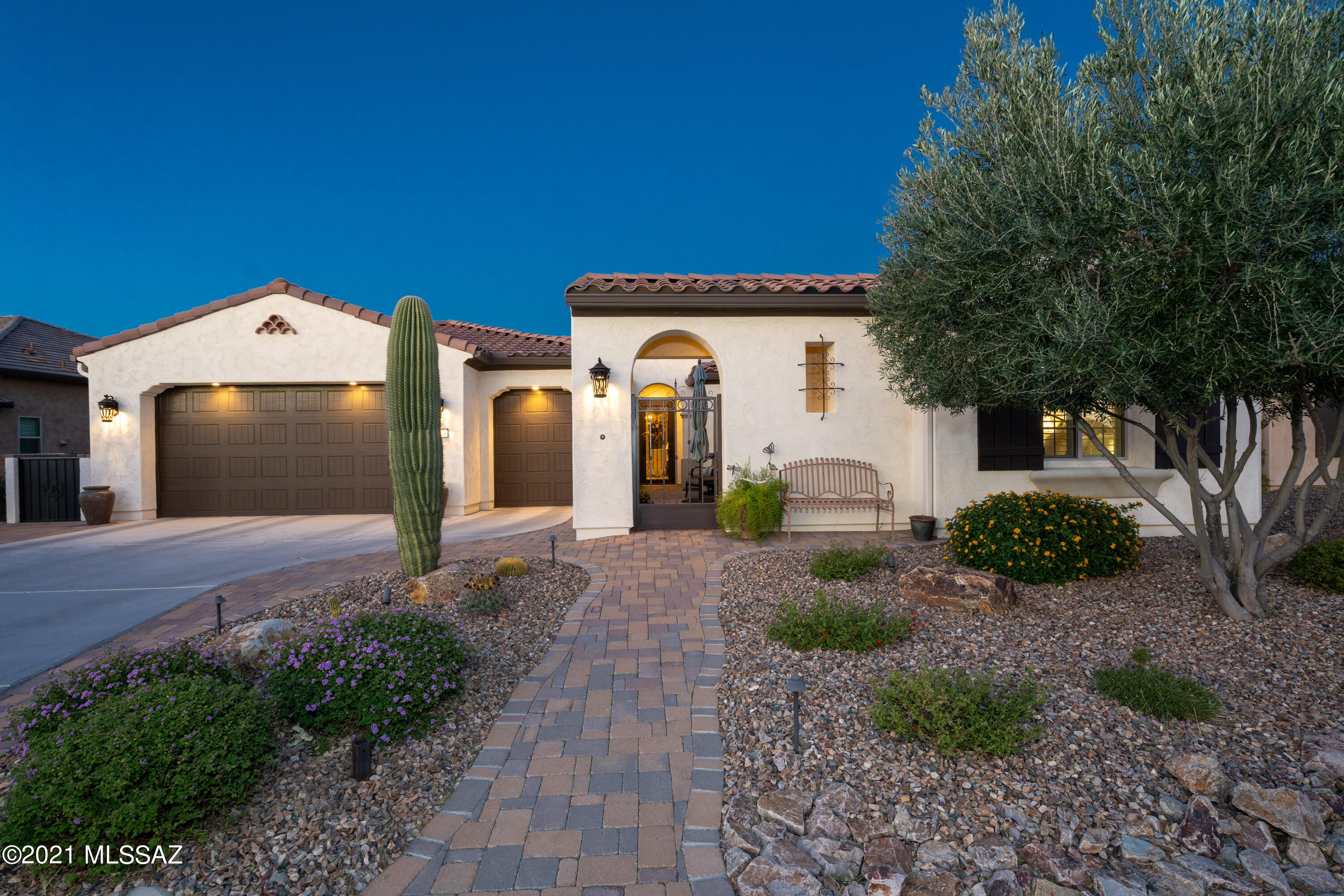 Expanded Tesoro on a premium Golf Course lot, attached Casita & 2.5 Car Garage. Exceptional features-gated front courtyard, Great Room with wet bar, Cooks will love the Gourmet Kitchen, breakfast bar island, GE Cafe SS appliances, gas cooktop, Wall Oven, and Microwave/Oven, gorgeous granite counters and both Butler's & Walk in Pantries. Elegant Primary Suite with spacious Walk In Closet and Spa Bath with dual
vanity, Walk In Shower & 6 ft tub. Storage is abundant with all Rooms having Walk In closets. Expanded Den w/double doors & closet, ensuite Guest Bedroom, fantastic Outdoor Living Spaces with Covd Patio & Gas Fireplace, Ramada, Pond with Waterfall and lush easy-care landscaping. Rear yard overlooks common area & 3rd Hole Of Roadrunner Golf Course. Elegant Custom Features throughout!