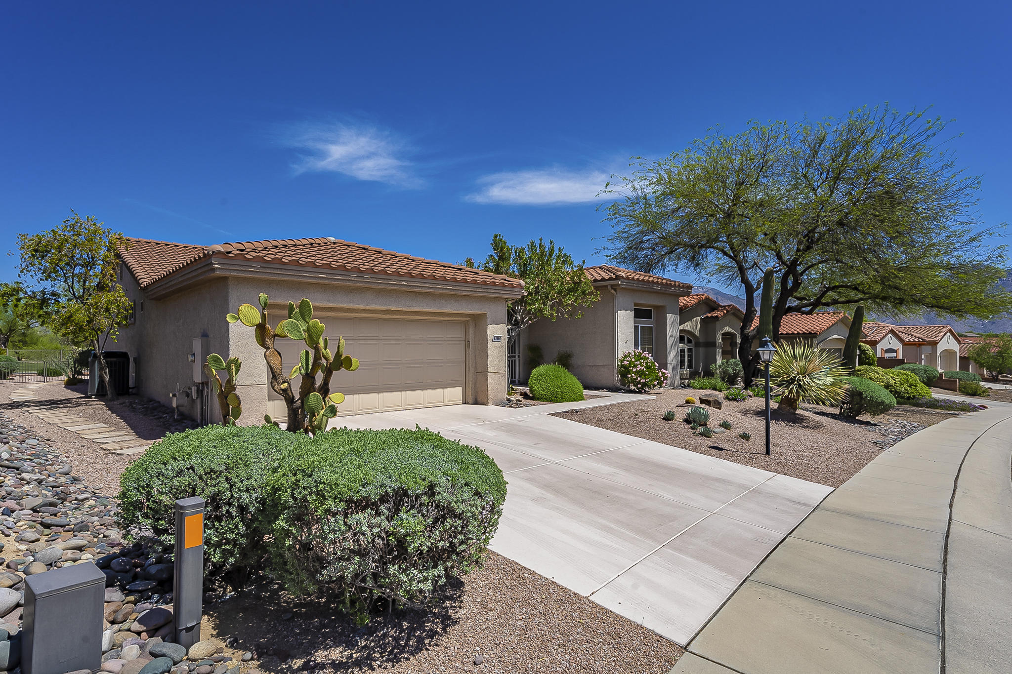 Built 1995: Stunning 3 Bedrooms, each with ensuite bath. Located on Sun City Rancho Vistoso's golf course at the 4th hole, this home boasts exquisite mountain views from the covered back patio, family room, Master bedroom and guest bedroom. Formal Living Room and Dining Room. The remodeled kitchen opens to a casual living area. Alder Cabinets, Solid Surface Countertops, plenty of counter space and cheery breakfast nook. Master Bedroom features Walk-in Closet, Jetted Garden Tub, Separate Shower and custom Cabinets. Carpeted Bedrooms/Den/Living & Formal Dining Area, tile in other areas. Appliances include Refrigerator, Electric Stove, Built-in Microwave, & Washer/Dryer. Landscaping service included. There's even room for your Golf Cart! Enjoy all the Sun City community amenities including Aquatic & Fitness Center with Lap Pool & Group Classes, Basketball Court, Bicycle Trails, Handball, Jogging Paths, Putting Green, Horseshoes, Miniature Golf, Pickleball, Racquetball, Shuffleboard, Tennis, Yoga, Discounted Golf and more! 45 + Community, See www.suncityorovalley.com for more details. No pets. Trash Included **$28.00 Mandatory enrollment in Resident Benefit Package. Includes HVAC filter delivery, cable internet concierge service and more! Ask agent for details.