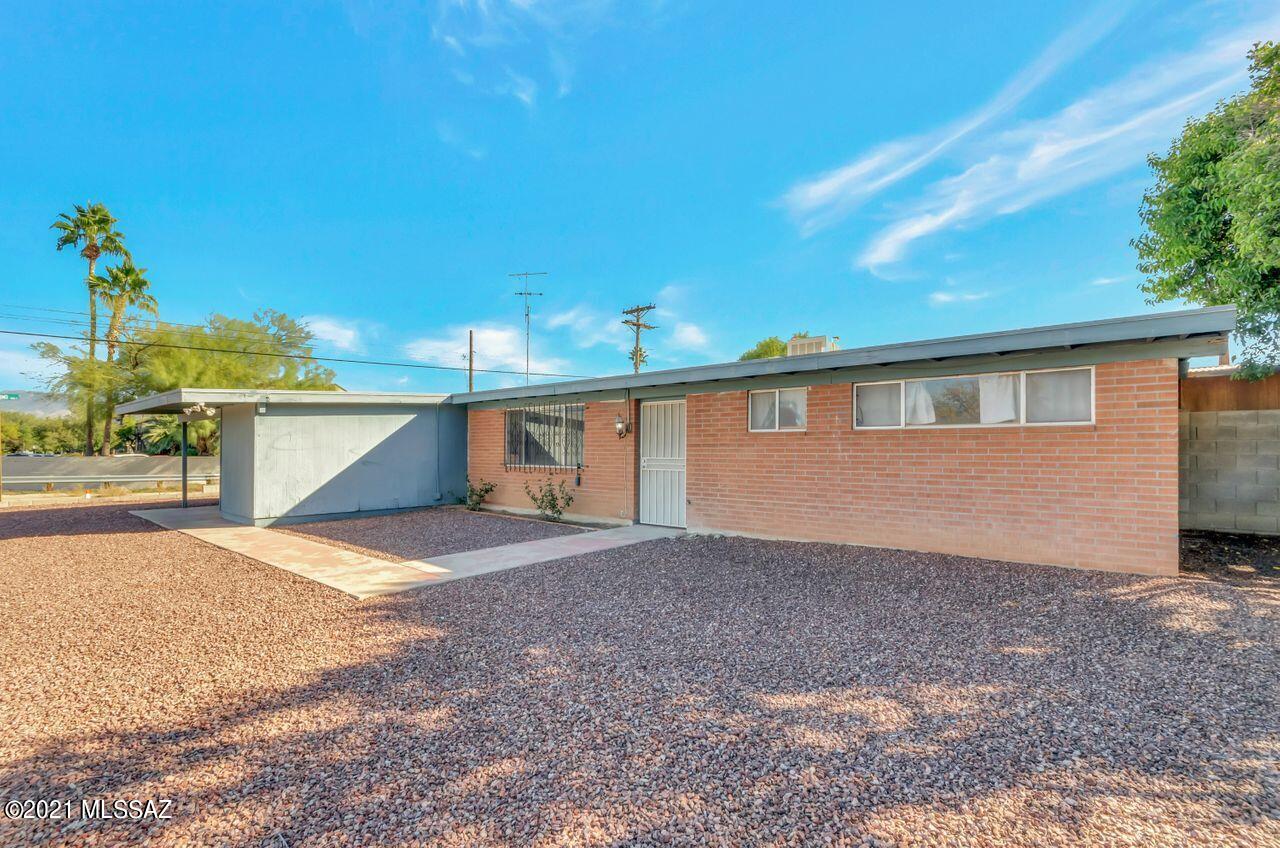 Super cute house on a large corner lot on the eastside, near shopping/dining. This 3 bed 2 bath had lots of upgrading, ALL in 2013: Kitchen remodel including new solid wood cabinets, counter tops, backsplash, added a breakfast bar, electric range w/ gas stub out, frig, garbage disposal & washer/dryer. (all appiances stay)  Also in 2013: New AC /gas pac, and new water heater. Both bathrooms got new vanities, cabinets & toilets. The owners also did some landscape upgrades and added ceiling fans throughout. There is an electrical hook up and space for an RV on this great sized corner lot, w/ a private backyard, side yard w/ dbl gate, BIG covered patio and NO HOA! See it before it's gone!