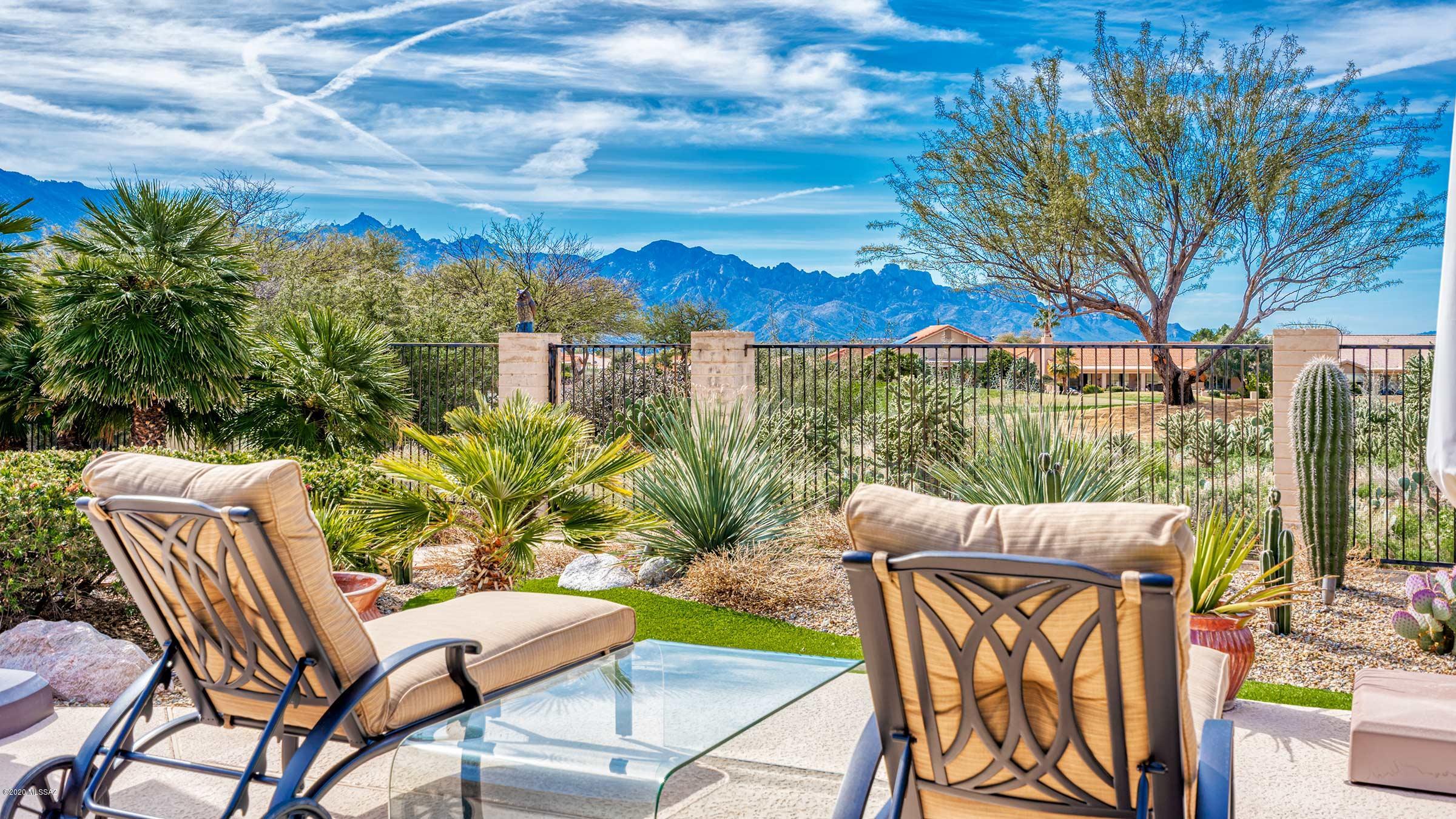 Views abound. Beautiful Estancia model with separate guest casita sited on large, private, golf course lot with Catalina Mountain views. Spacious patio and backyard with inviting in-ground spa are ideal for enjoying the Saddlebrooke lifestyle.