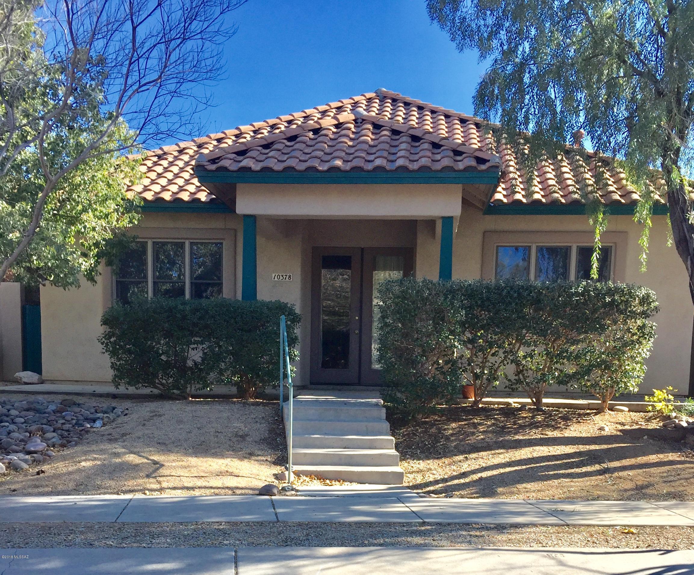 Charming Civano bungalow, built to celebrate community, simplicity of design, energy efficiency, & environmental harmony. Truly unique design. Sought-after, efficient great room design w/zaguan hallway allowing cool breezes to flow thru. Spacious living w/soaring ceilings, Chefs will love the kitchen windows looking out to tree-lined street, bringing in lots of light. FP with entertainment Center. Green Features: Solar tube, R42 Ceiling Insulation, R36 Walls, High efficiency HVAC, Premium Low E Andersen Windows, reclaimed water for landscape. Insulated garage & door. Garage is oversized with Cable outlet, 220 circuit, & Satellite. Gas stub for BBQ in backyard. This home is move-in ready!  Professionally cleaned. New Carpet. Newly painted interior. New Gas Range. And there is more!   New sink and disposal.  The home also includes 3 interior Hunter Douglas fans.  2 Fans on the back patio.  Water Softener.  Garage is 24x24. 1-2 minute walk to pool, tennis, tot lot, community garden, Neighborhood Center. Walk to Civano's Coffee Shop. Community offers book club, Yoga, knitting club and more. Dance studio, hair salon, optometrist, Civano Nursery, bocce ball, tennis, pickle ball, and a 2-mile walking track.  The Community is on the Sun Tran bus route.  Also close to city-wide bike/walk loop and across from internationally known Fantasy Island for cyclist.   Solar hot water has been disconnected.  Conveys AS IS.