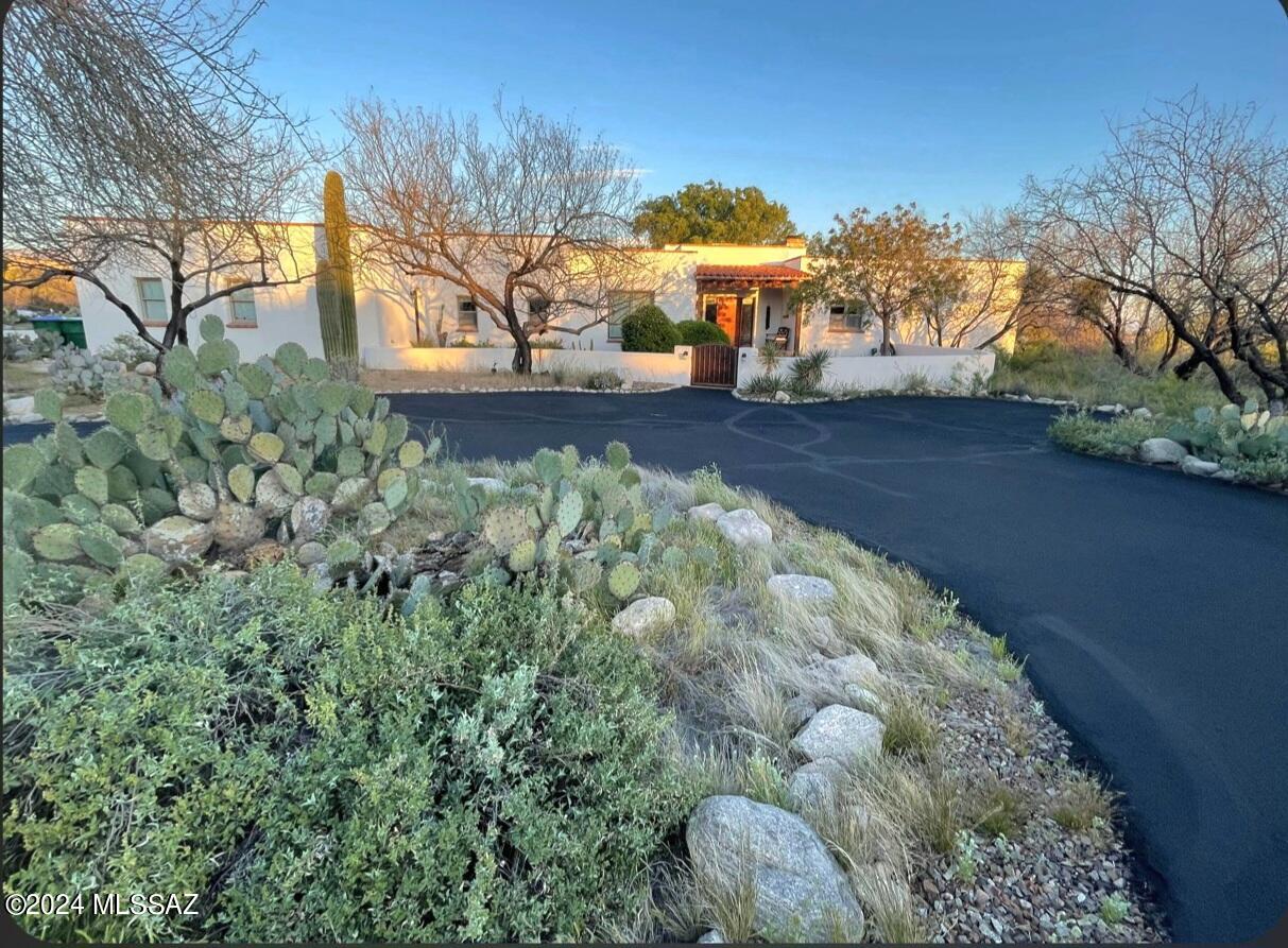 Exquisite 5-bedroom, 2.75-bathroom home nestled on 3.3 acres of scenic beauty. This custom-designed residence boasts a stunning park-like backyard and breathtaking views, creating a perfect blend of elegance and nature. A true gem for those seeking both luxury and tranquility.