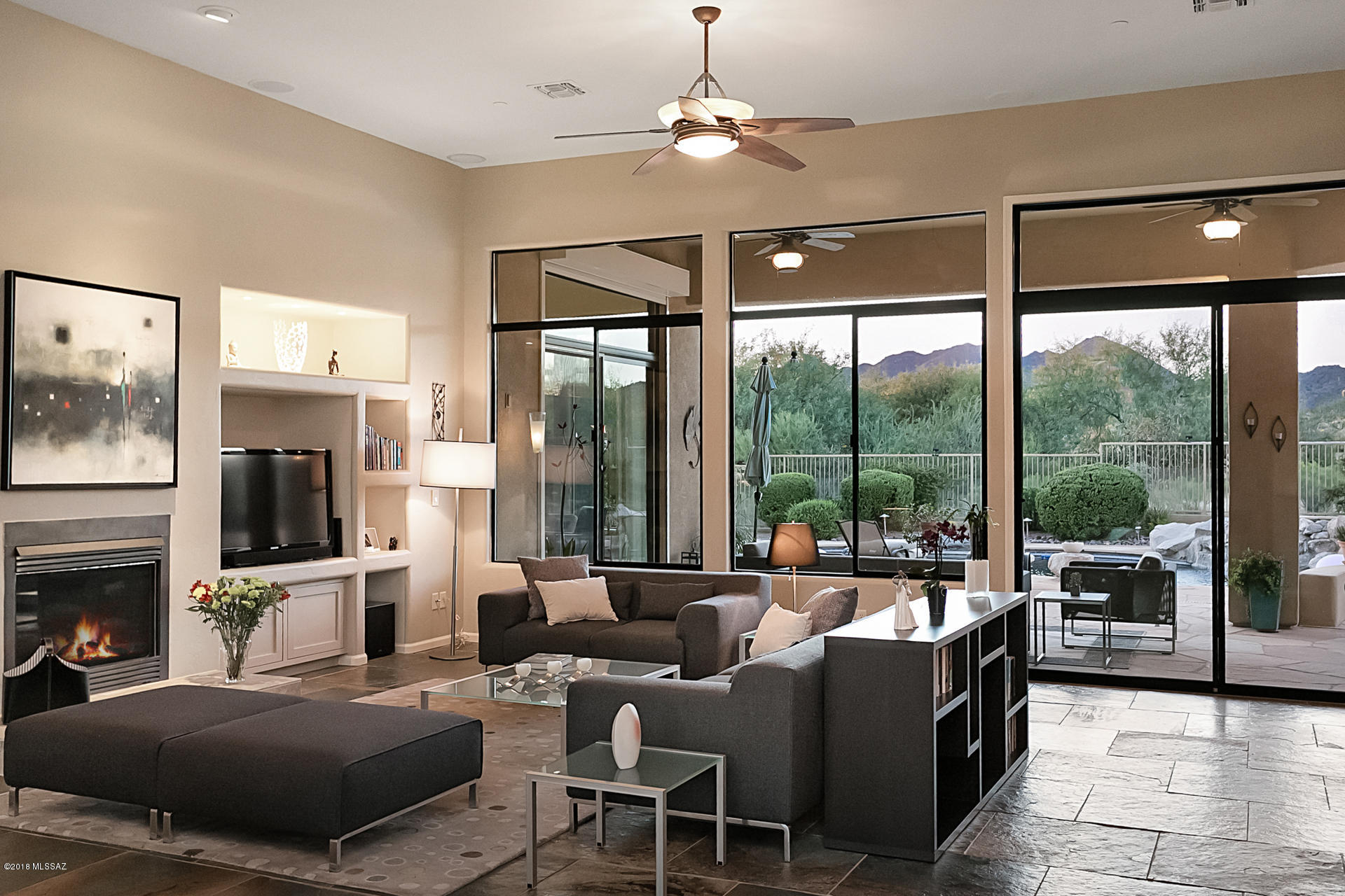 Life here is the perfect antidote to burn out from the stresses of the day! Enjoy the blissful benefits and the ultimate experience that this hidden gem located in a quiet, gated enclave within Vistoso Highlands and the desirable master planned community of Rancho Vistoso has to offer. 
Immerse yourself in everything the Sonoran Desert is famous for along with extensive biking and hiking paths, golf, tennis, indelible vistas and stargazing in the heart of the incorporated town of Oro Valley.
Click on the detailed floor plan and the custom drone video (both under the Virtual Tour tab) which include beautiful photos providing a virtual tour of this wonderful home.