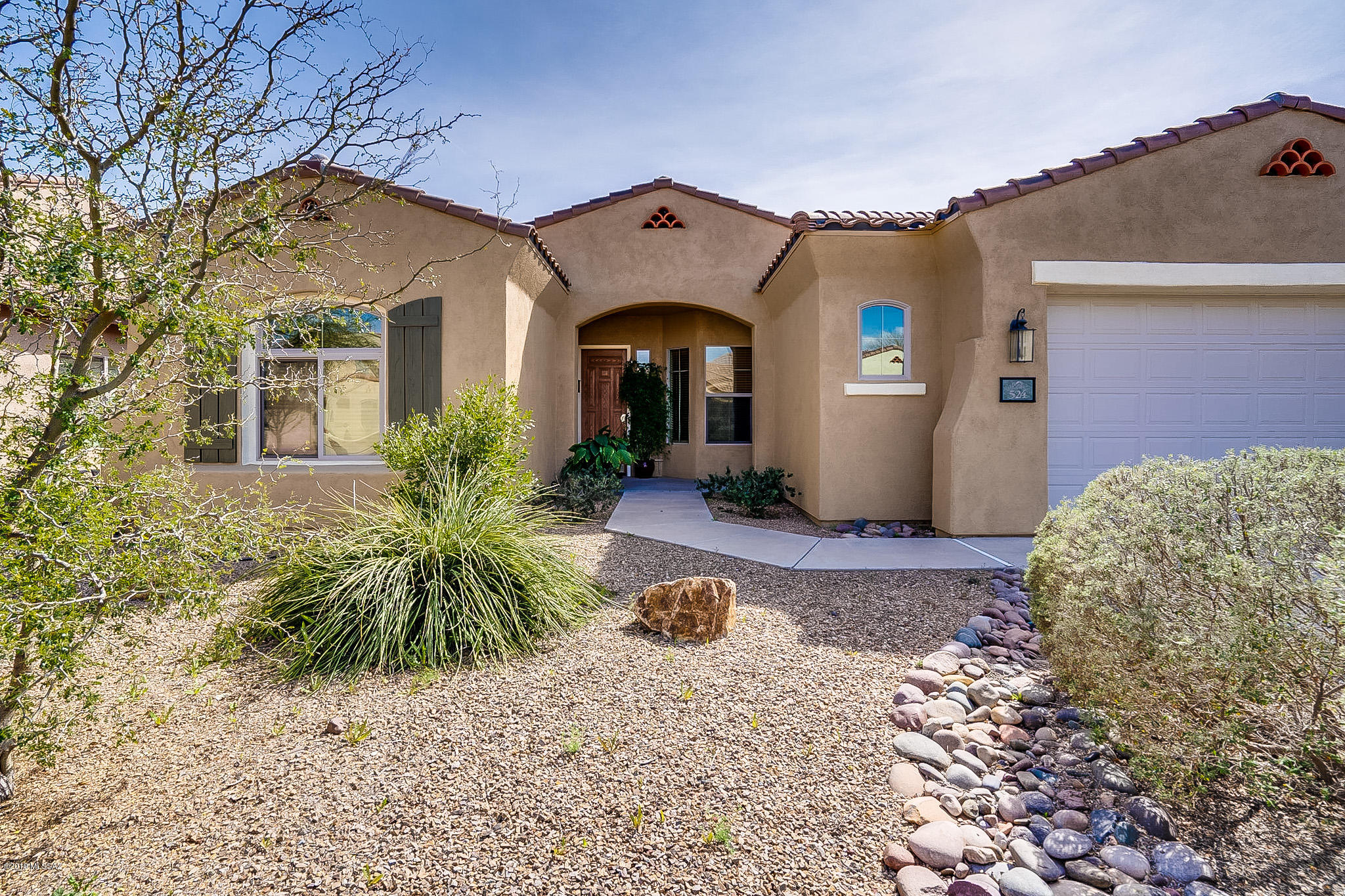 GORGEOUS MOUNTAIN VIEWS!!! NO REAR NEIGHBORS!!! Beautiful Pulte Built one story home just steps from community recreation center, water park, pools and spa, lake, workout center, walking/biking paths, tennis, basketball, putting green and so much more! Split bedrooms, great room/kitchen open floor plan, black appliances, raised dishwasher, solid surface counters, raised oak panel cabinets, ceramic tile throughout except bedrooms, washer/dryer room w/cabinets, generous master suite with bay window, jetted garden tub/separate shower in master bath, large walk in closet, built in desk area/shelving in den, ceiling fans and blinds. Backyard features a large covered patio w/extended flagstone, brick paver pathways front and back. Beautiful landscape. Solar system owned.
Don't miss this one!!!