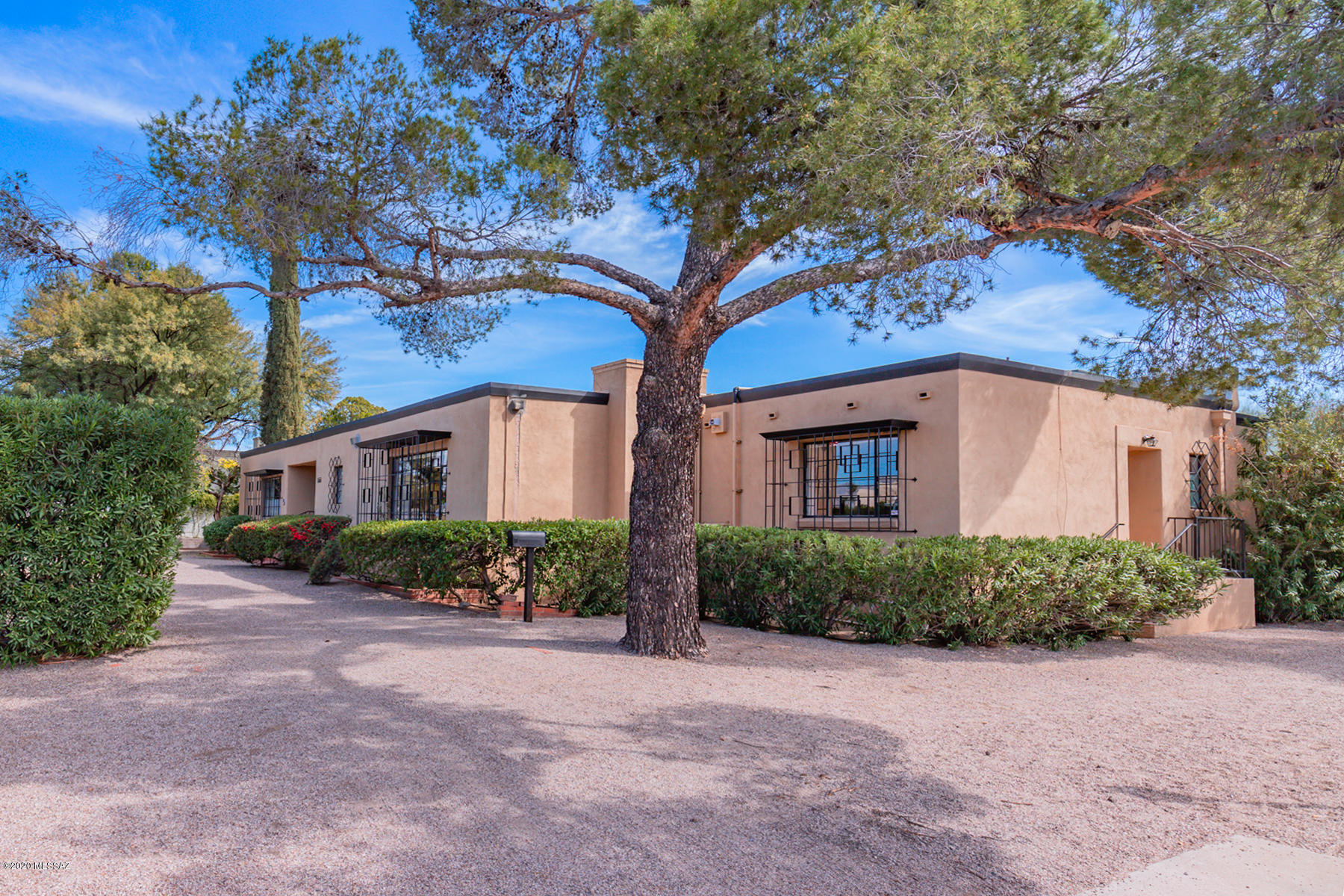Location, Location, Location. Just a block away from the Arizona Inn and University Medical Center, in the sought after Blenman Elm  historic neighborhood. Refinement and charm of yesteryear in one of Tucson's loveliest neighborhoods.

On the market for the first time in over forty years! A rare opportunity to restore this historic home, designed by Arthur T. Brown, into your very own mid-century masterpiece.

Brown, Tucson's desert modernist, was a pioneer of passive solar design known for crafting structures finely attuned to the rhythms of the sun and seasons.

This special property includes a 3 bedroom, 3 bath, 3300+ sqft main house with courtyard, guesthouse, pool, 3 car garage  and workshop/studio.
