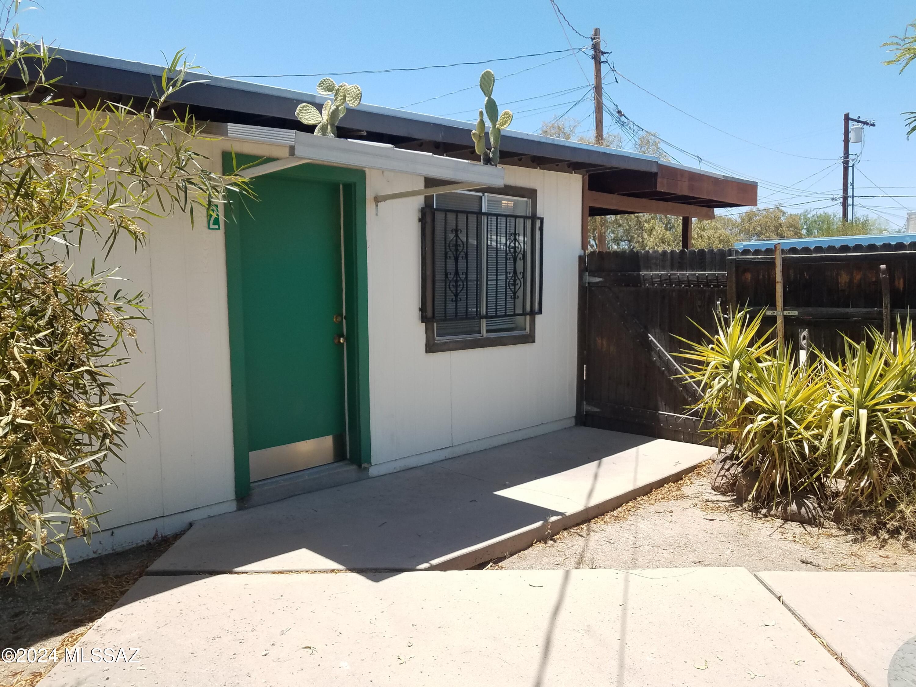 his Cozy Private Studio is located just minutes from Downtown Tucson and the University of Arizona! Featuring AC! The living and eating area are open to the kitchen and have plenty of natural light. The kitchen includes the stove and fridge. There is a separate area where you'll find your bathroom with standing shower and a large closet, this space features a ceiling fan, skylight, and could be used as a study or sleeping area. The entrance to this home is through the Back road/alley, there is a dirt lot that allows for parking so you will not need a permit. You will enter the home through the back private fenced patio and yard, in addition to your own outdoor space you will also have access to a shared yard with the main house.

This home will be available on 3/13/24 for a 1-year lease. The rental rate is $750.00, per month and the security deposit is $1,125.00. 25 DLLs billback per month. If pets are allowed and approved, there is a monthly pet fee ranging from $25 - $100 per pet, plus a one-time $150 non-refundable pet fee, per pet. The monthly fee is determined by PetScreening.com

Our residents are automatically enrolled in our Resident Benefit Package. The cost of this program is $35 per month. For more information regarding this program, please go to bluefoxproperties.com to the For Residents tab on the banner and click on the Resident Benefit Package on the drop-down menu.

Every adult age 18 and over must complete an application. The application fee is $55 per adult. The application process includes credit, criminal, previous rental history, employment, and income verification. Residents are required to obtain and keep liability and renter's insurance in full force and effect during the full term of the lease agreement and any subsequent renewals. The coverage must include at minimum the following:

$20,000 renter's content coverage
$100,000 tenant liability insurance coverage
$10,000 renter's bodily injury coverage

Our residents may purchase their own policy as long as Landlord and Agent are listed as "additional insured". It is important to note that "additional insured" and "additional interest" are not the same thing. If the policy provider will not name Landlord and Agent as "additional insured", our residents will have to find an alternate provider that will. Our residents must provide a copy of the policy to Blue Fox Properties, LLC prior to lease signing and prior to signing any lease renewal. If the copy is not provided prior to lease signing, Tenant will automatically be enrolled in the insurance policy provided through Blue Fox Properties, LLC and charged accordingly. The cost of the Blue Fox policy is $20.

Our minimum rental requirements include the following:
1.The applicants' household verifiable gross monthly income must be 3 times the rental rate.
2.All our homes are offered as non-smoking. No smoking is allowed on the premises, inside or outside the home.
3.Reasonable credit which includes but is not limited to an average credit score of 580 for all applicants combined. If you are concerned about challenged credit, you may be able to address this concern by adding a cosigner or offering additional security deposit. Contact us for details.
4.If this property is located within the City of Tucson, housing vouchers will be considered.
5.Applicant to provide proof that debts to previous landlords have been satisfied. An eviction can be grounds for denial.
6.No felonies for the past 10 years related to property damage, illegal substance manufacturing or distribution, or assault. Other criminal activity may be grounds for denial.
7.All pets are subject to approval.
8.No bankruptcies that have not already been discharged.
9. All current or pending collection accounts owed to any utility companies must be paid in full, with no exception, and must provide a receipt from the collection agency or utility company stating the collection fee has been paid or settled.
10. You must fill out an application on bluefoxproperties.com. Applications submitted through any other site will not be accepted and Blue Fox will not be responsible for any refunds.

Blue Fox Properties is an Equal Opportunity Housing provider. We are also licensed REALTORS.
