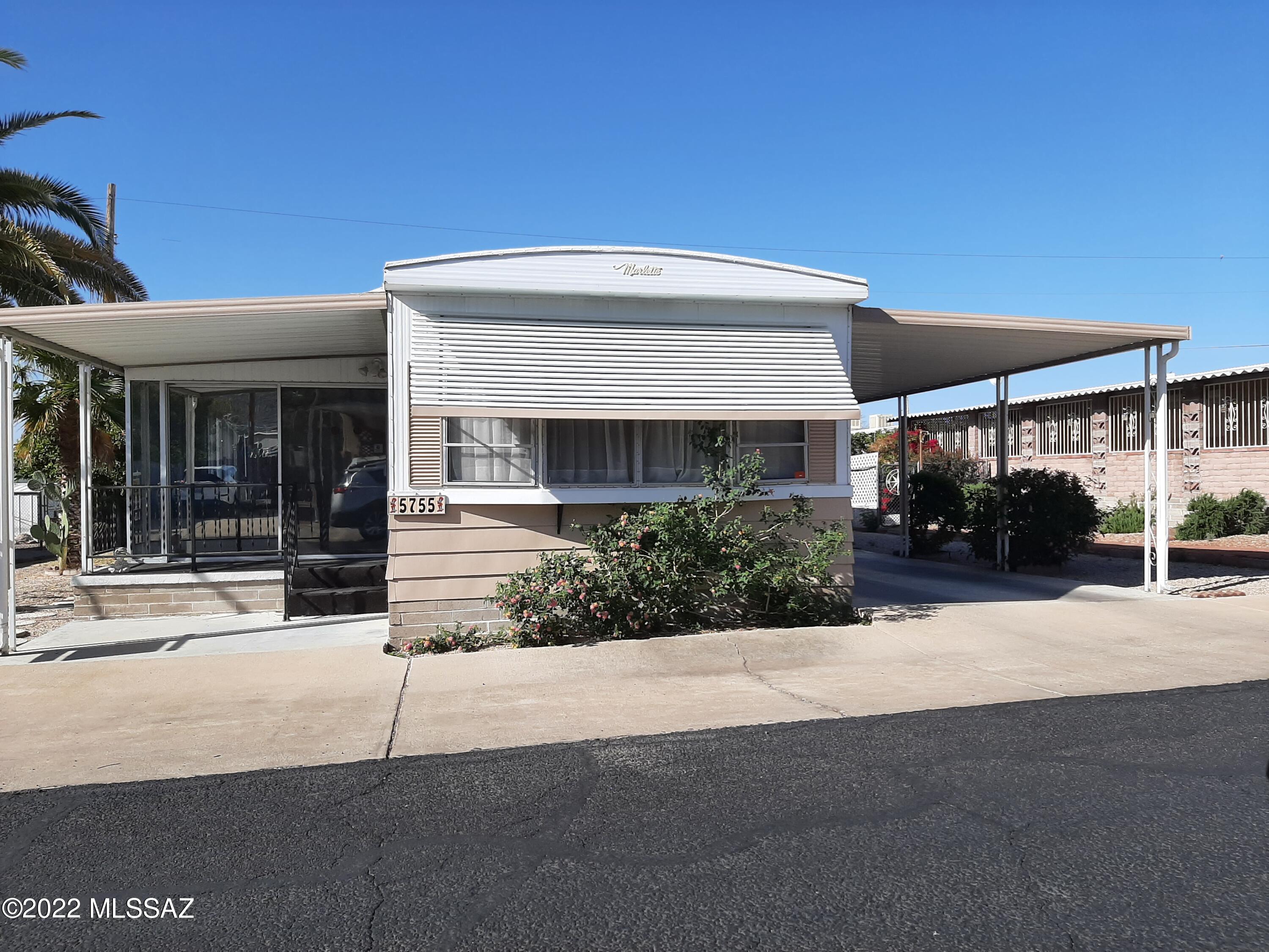 Tucson Estates ''55-Plus'' Community.  Well maintained North facing mobile home.  2 bd, 2 ba.  Nice Arizona  Room to enjoy your morning coffee. Perfect winter retreat or year around home.  HOA fee includes unlimited golf, tennis, pickleball, shuffleboard, 3 pools, exercise room, spa and trash collection. There are many other activities too numerous to list.