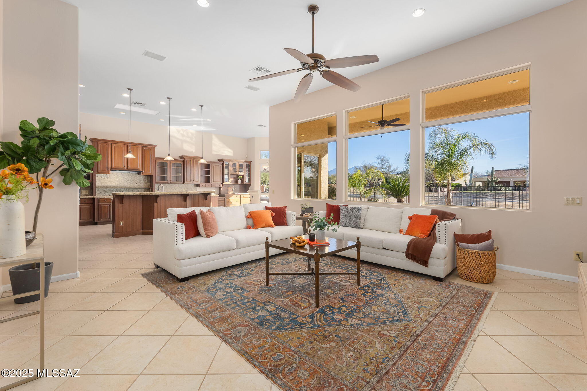 HUGE Price Improvement! Looking for a true Diamond in the Rough? Come see & stay in this never before offered, Custom built home on a double, corner lot located on the Signature tee at the sought after Robson 55+ community of Quail Creek! This one of a kind property offers some of the very best of the Active, Resort lifestyle that Southern Arizona has to offer! Spacious Great Room floorplan overlooks your private pool & spa, outdoor kitchen, firepit, and those forever views of the golf course, multiple mountain ranges, and lake. Inside you'll love the well equipped kitchen with extensive cabinetry, double ovens, wine bar & storage. Luxuriate in the huge Primary suite with fantastic walk in closet! Executive office,en-suite guest bedroom, and separate guest Casita! 4 car garage!