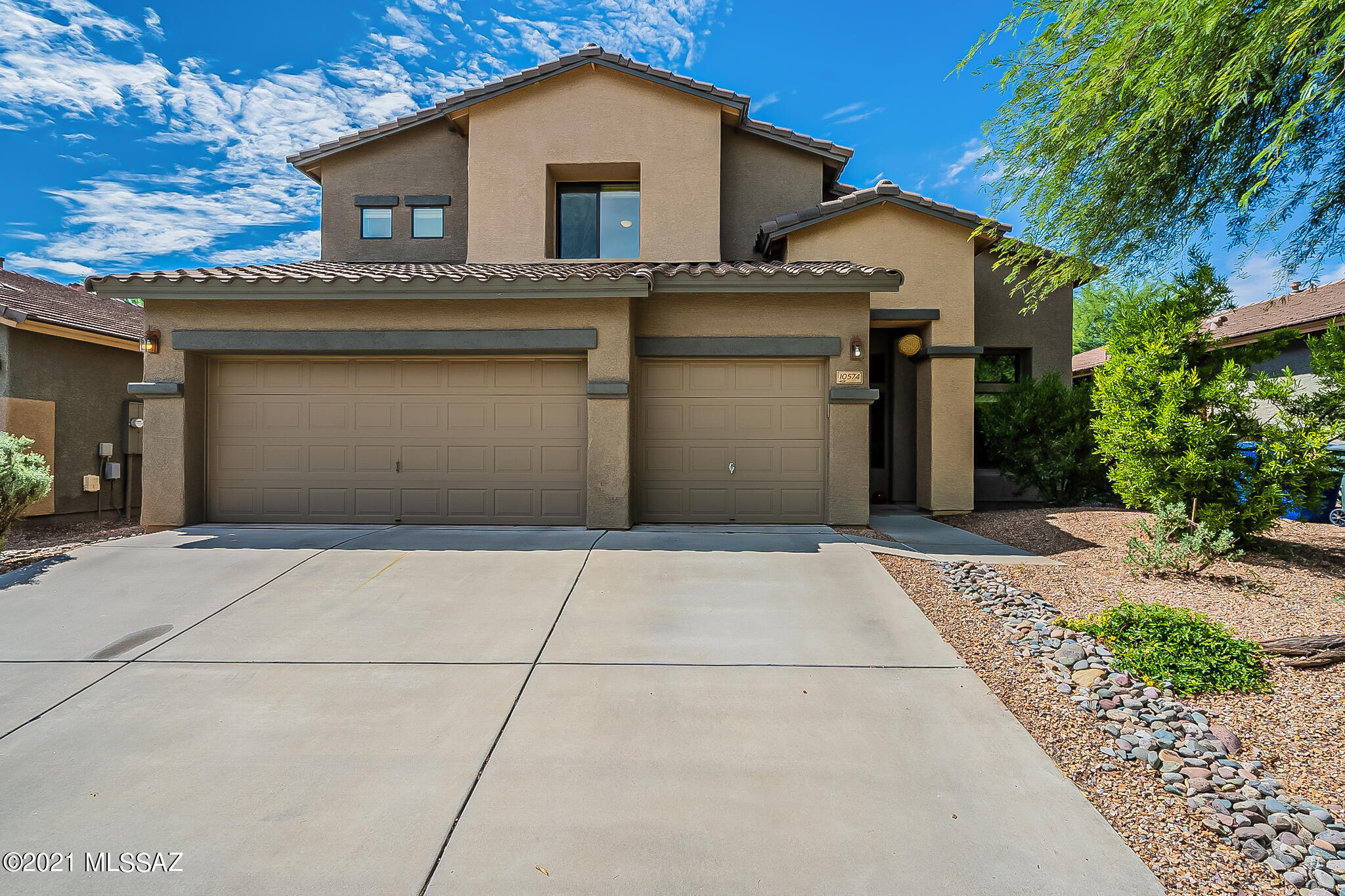 Spacious & elegant comfortable living nestled in the beautiful Mesquite Ranch community. Lovingly maintained by the ORIGINAL OWNERS this 4 Bedroom home with a LARGE LOFT & A MAIN FLOOR PRIMARY BEDROOM w/oversized bath welcomes you with SOARING 20FT CEILINGS. Formal living & dining, powder room & family room that opens to large open kitchen w/ island & extended upper cabinets. Second story includes 3 guest bedrooms w/a guest bath & large loft overlooking family room & kitchen. Don't miss the entertainer's backyard with a covered patio that extends the width of the home & freshly landscaped yard. New dishwasher 2021, patio roof recoated 2021, newer water heater 2019, HVAC 2018 and painted outside 2017. See all upgrades in document tab. Located near all conveniences AND within the VAIL School Dist. Community includes pool, playground, sidewalks and parks. Don't miss this opportunity!