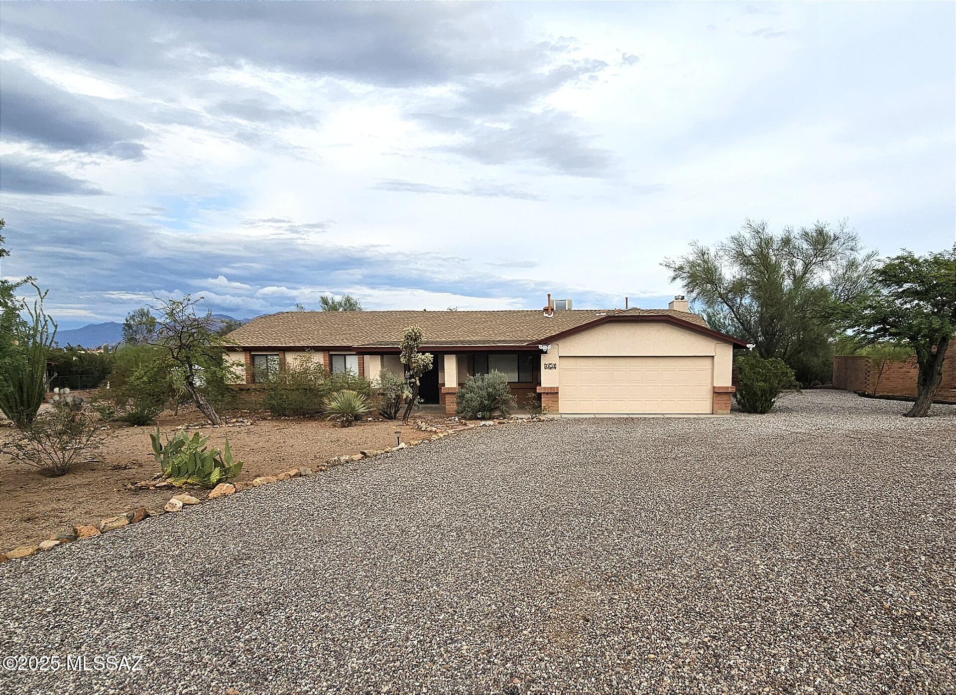 $600 off move in costs
This 1,767 SQ FT single-story home in Tucson's desirable Del Cerro Estates neighborhood features 3 bedrooms and 2 bathrooms with a functional and well-designed layout. The kitchen is equipped with a dishwasher, oven, and refrigerator and flows seamlessly into the sunken great room living area with vaulted ceilings, while carpet and tile flooring are thoughtfully placed throughout the home. Ceiling fans are in every room except the living area, and new blinds are installed throughout. The primary and secondary bedrooms are generously sized, offering comfort and privacy. A 2-car garage provides convenience and plenty of storage. Step outside to a brand-new private swimming pool with a fenced backyard, offering breathtaking mountain views that create a serene and inviting space for relaxation or entertaining. The covered patio includes pull-down shades for added comfort, and the home also features a dog door. Residents enjoy easy access to nearby trailheads, including El Camino del Cerro and Sweetwater Preserve, as well as I-10. Located in the sought-after Del Cerro Estates community, the home is close to local schools, parks, dining, and entertainment, combining comfort, functionality, and an unbeatable Tucson location.