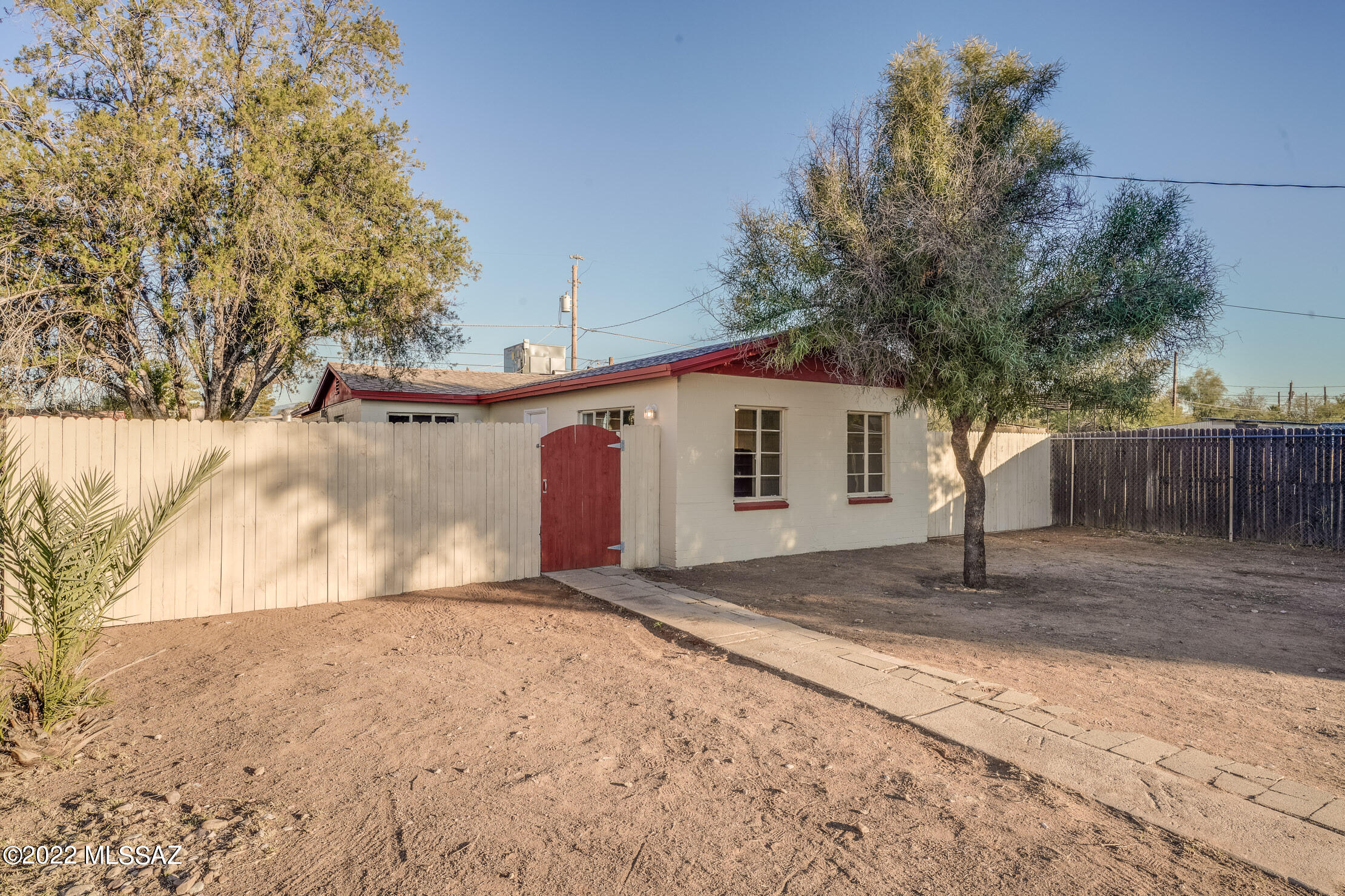 Cute, cute, cute! You will fall in love with this wonderful starter home in central  Tucson. Close to everything on a large lot and tastefully remodeled.  You will love the kitchen with granite counter tops  and the authentic mid century built ins. Tongue and groove ceilings  and updated bathrooms make this home super special and comfortable. Seller is a licensed real estate agent in Arizona.