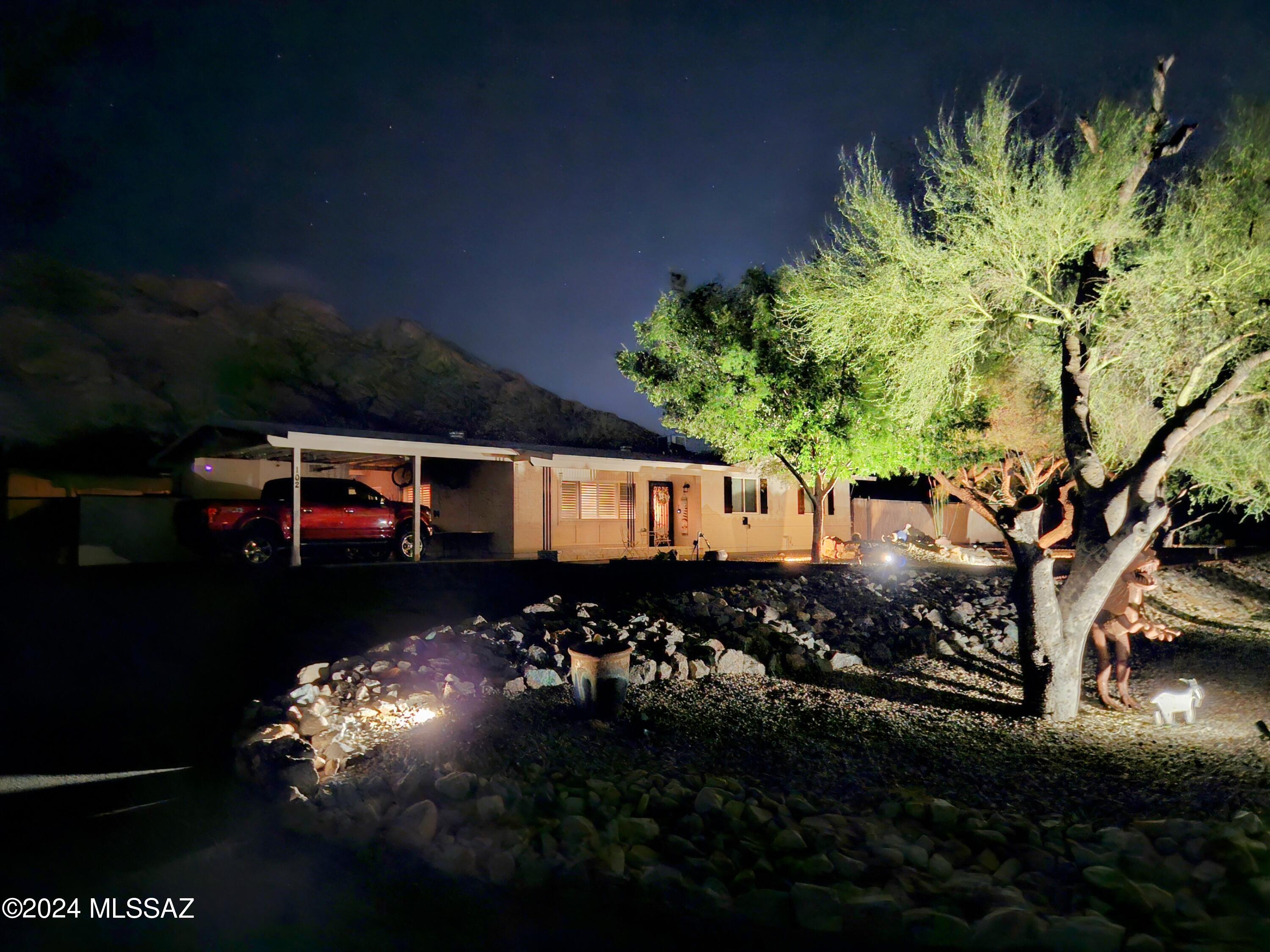 Rare opportunity to buy in Shadow Mountain Estates! 102 W. Meadowbook Drive is pure Tucson charm! This property has it all--1.1 acres of gorgeous mountain views, a tastefully updated 3 bed 2 bath house (granite kitchen and open concept living area), spacious workshop with air-conditioned office, 3 separate storage rooms, RV hookup and patio...we could  go on and on! Please find list of updates attached. Beautifully landscaped front and back yards include custom double gate, turf, gazebo, grill station, covered patios and plenty of additional space for a pool! This home is perfect for entertainers and craftsmen alike. Minutes from the Oro Valley Aquatic Center, schools, shopping, dining and Catalina mountain hiking--all the best that Oro Valley has to offer!