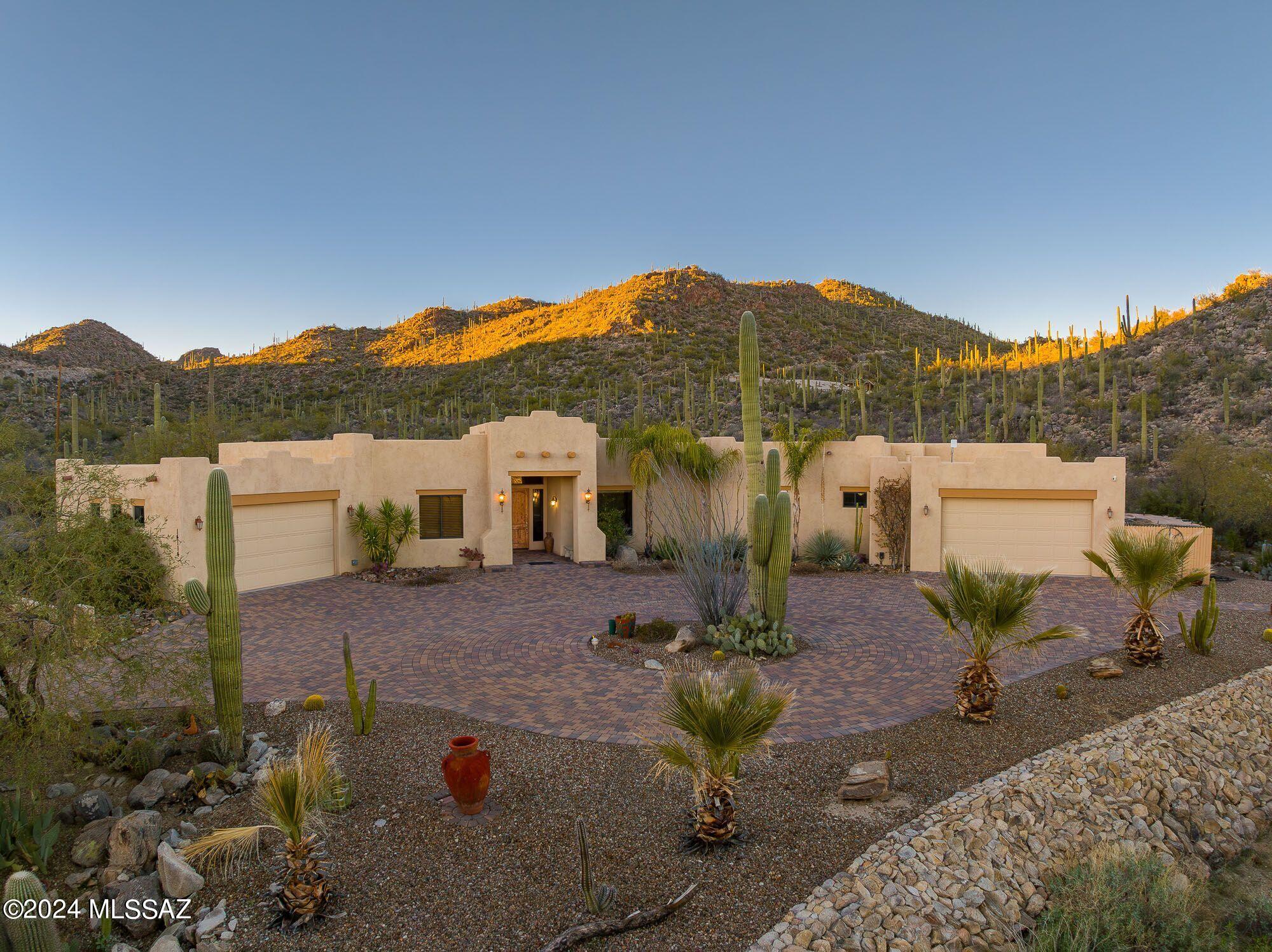 WELCOME to your dream home nestled in the hillside on 6.06 acres in the Tortolita Mountains, with endless breathtaking views of the mountains and city lights. This 3334 sqft luxury home has 5 bedroom and 3,5 baths which include 2 owners suites. The gated Tortolita Estates provides 14,000 acres of National Forest land for hiking, biking, horesback riding, or 4 wheel exploring. Enjoy a pebble tec salt water sparkling pool, wrap-around patio, great entertainment areas. The home is tiled throughout and the design thoughful with spacious great room plus formal dining and breakfast area. garage space is for 5 vehicles. There is no HOA.