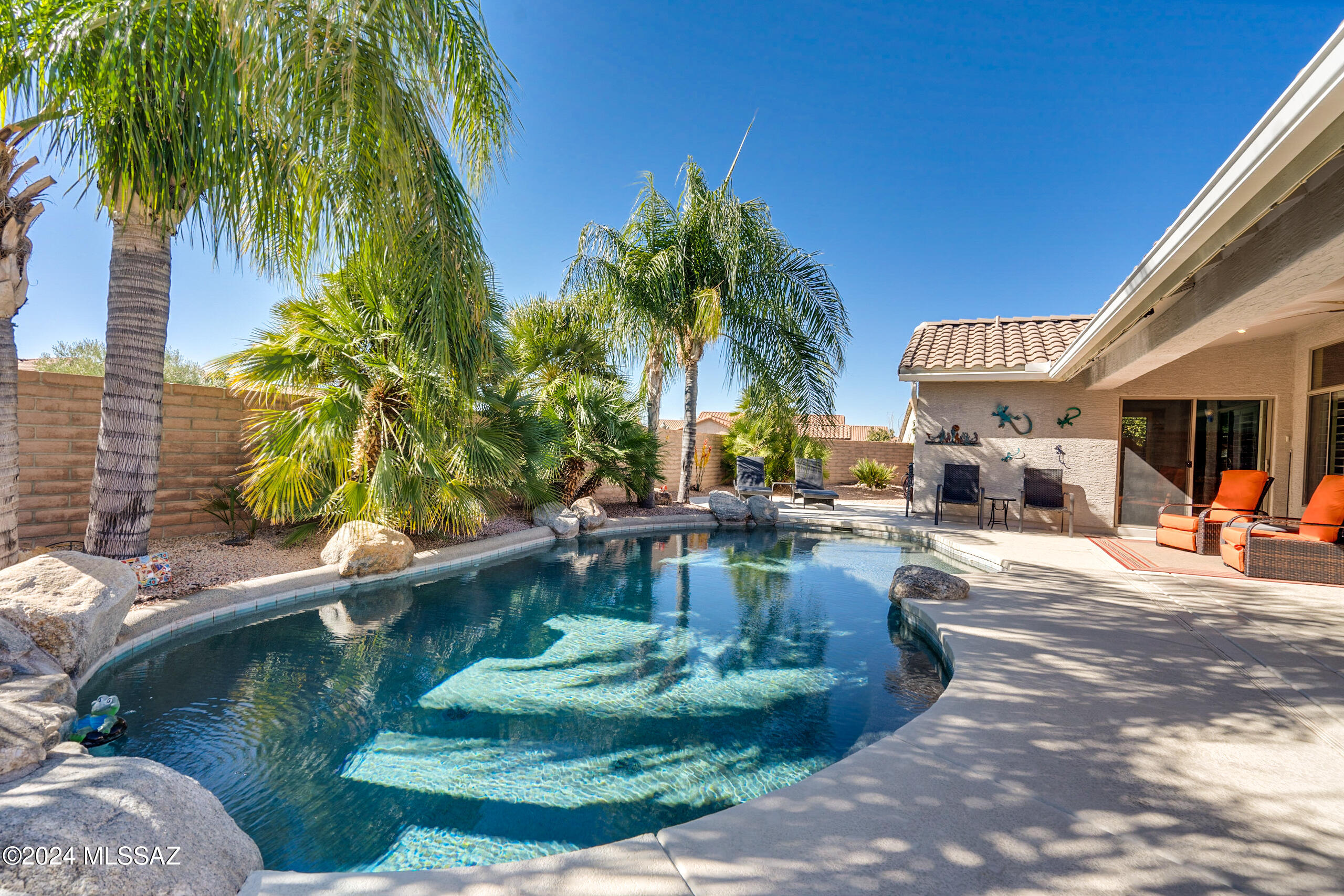 Everything you need ... and more! Stunning, exp. Augusta model on a large corner lot offers heated pool and spa, 2-room private casita, and detached golf cart garage. Inside this 1,655 sq.ft. main house are 2 BR, 2 BA +Den with all tile floors, upgraded kitchen w/ quartz counters, SS appliances, dining area w/ bay window, plantation shutters. Owner's suite w/ generous size WI closet and exit to rear patio. Across the front paver courtyard is a spacious 464 sq.ft., 2-room casita w/ full bath, ideal as an in-law suite or craft studio. Outback is your own private oasis, with extended patio and seating areas, pebble sheen pool and spa, BBQ area, and mature citrus trees. Main garage w/ mini-split, epoxy floors; detached ext. length golf cart garage w/ room for storage or work area. New roof.