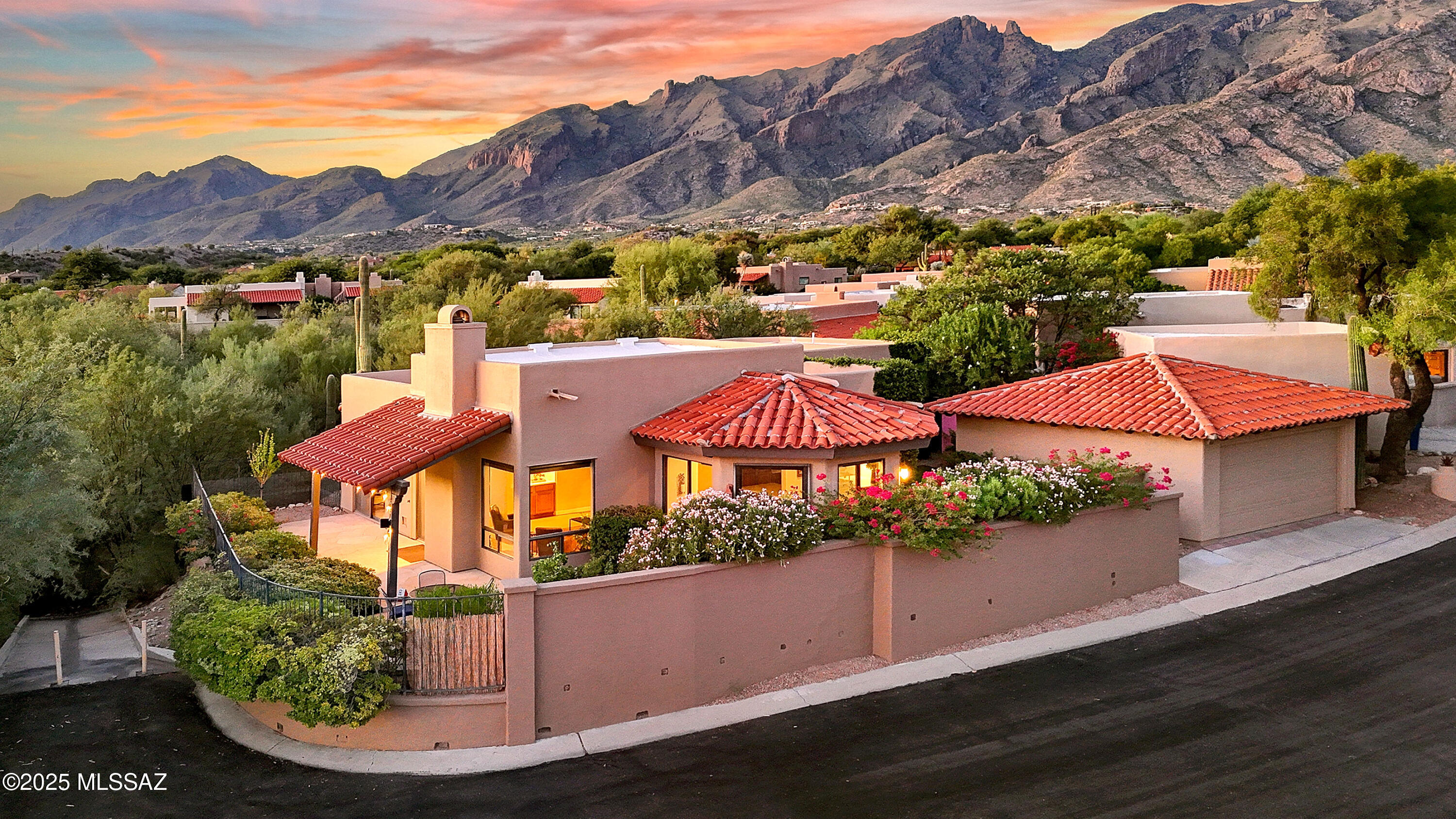 Location, Location! This spectacular home on the golf course in the highly sought-after gated resort commty of La Paloma is a rare find, offering dazzling city views to the south & private open space to the west. Natural flagstone patios open to a charming garden courtyard. Inside, hi beamed ceils, Brazilian oak flrs & abundant natural light accentuate the home's airiness, warmth & open design. Updates incl beautiful quartz counters, induction range, SS appl & natural stone bathroom floors.  Spacious primary features a sitting room, walk-in closet & ensuite bath. The lg 2nd bdrm also w/sitting area offers generous guest accommodations & comfort in addition to the den/art studio w/luxury flooring off the Primary.  This home's charm is like no other.   Commty amenities include a pool & spa